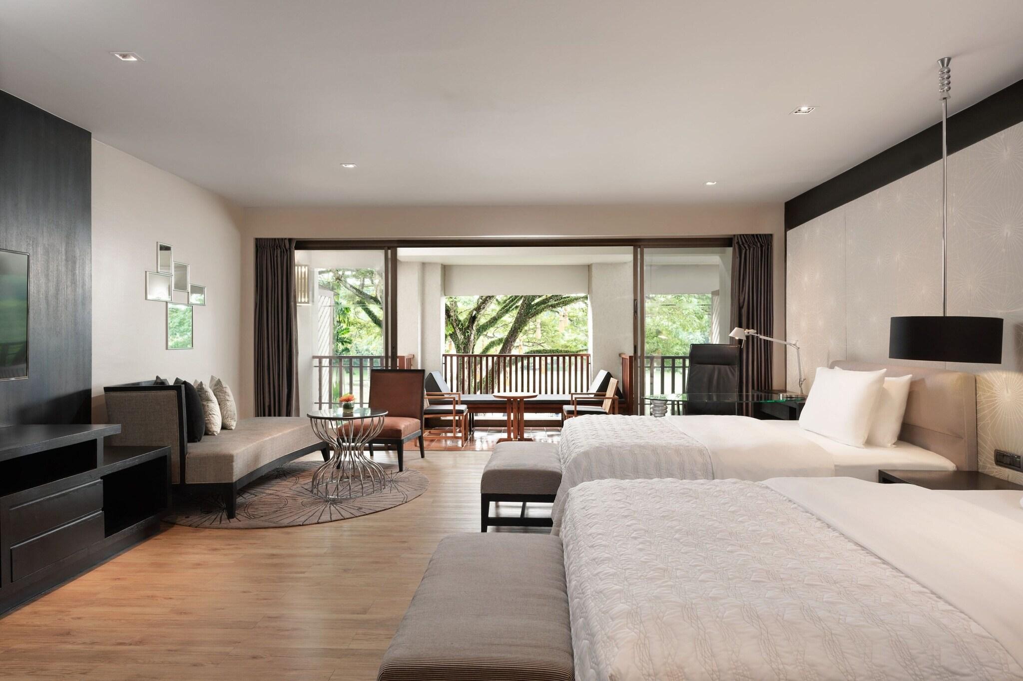 Quadruple Two Queen Beds Pool View