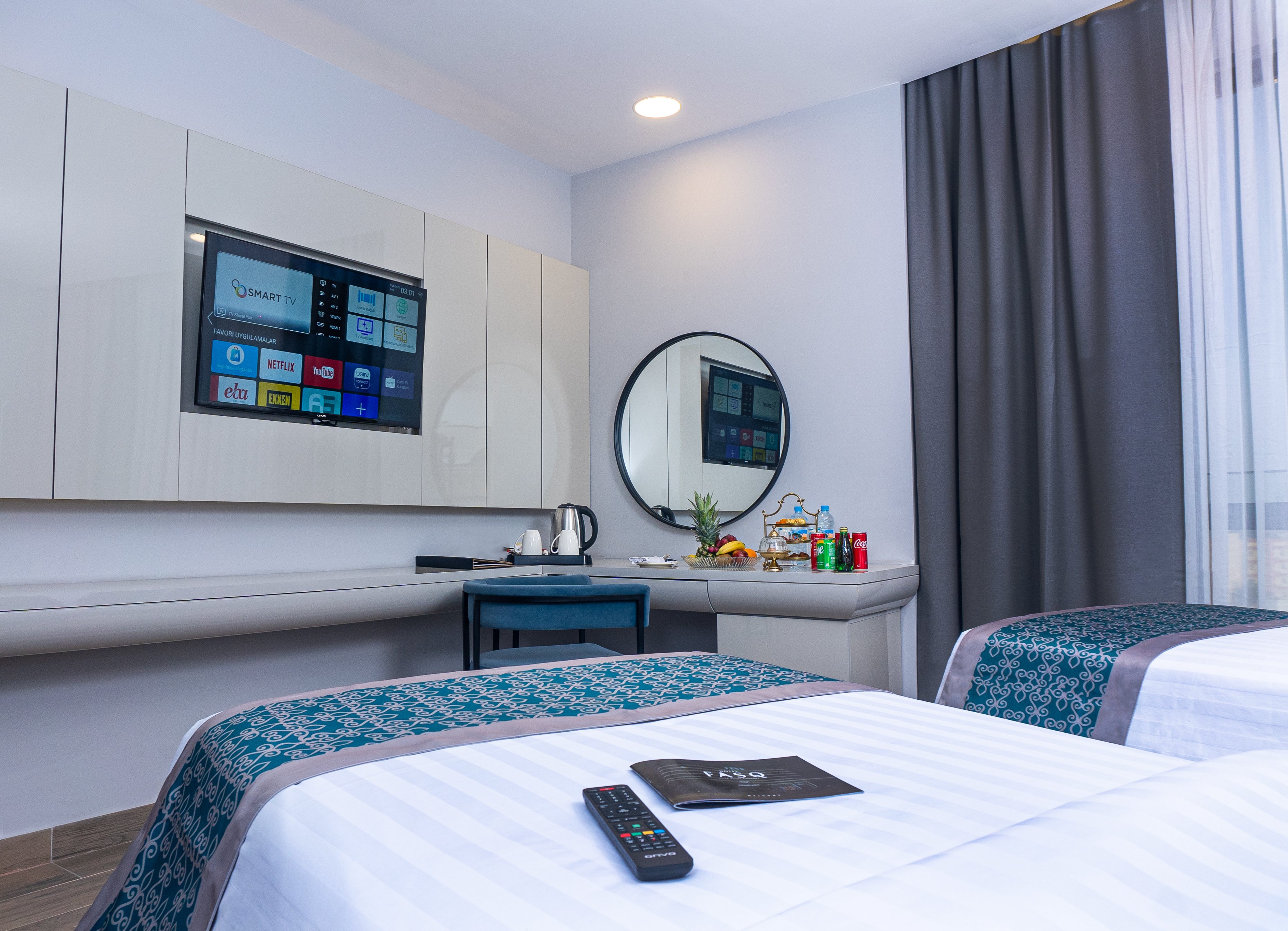 Twin Deluxe Queen Bed