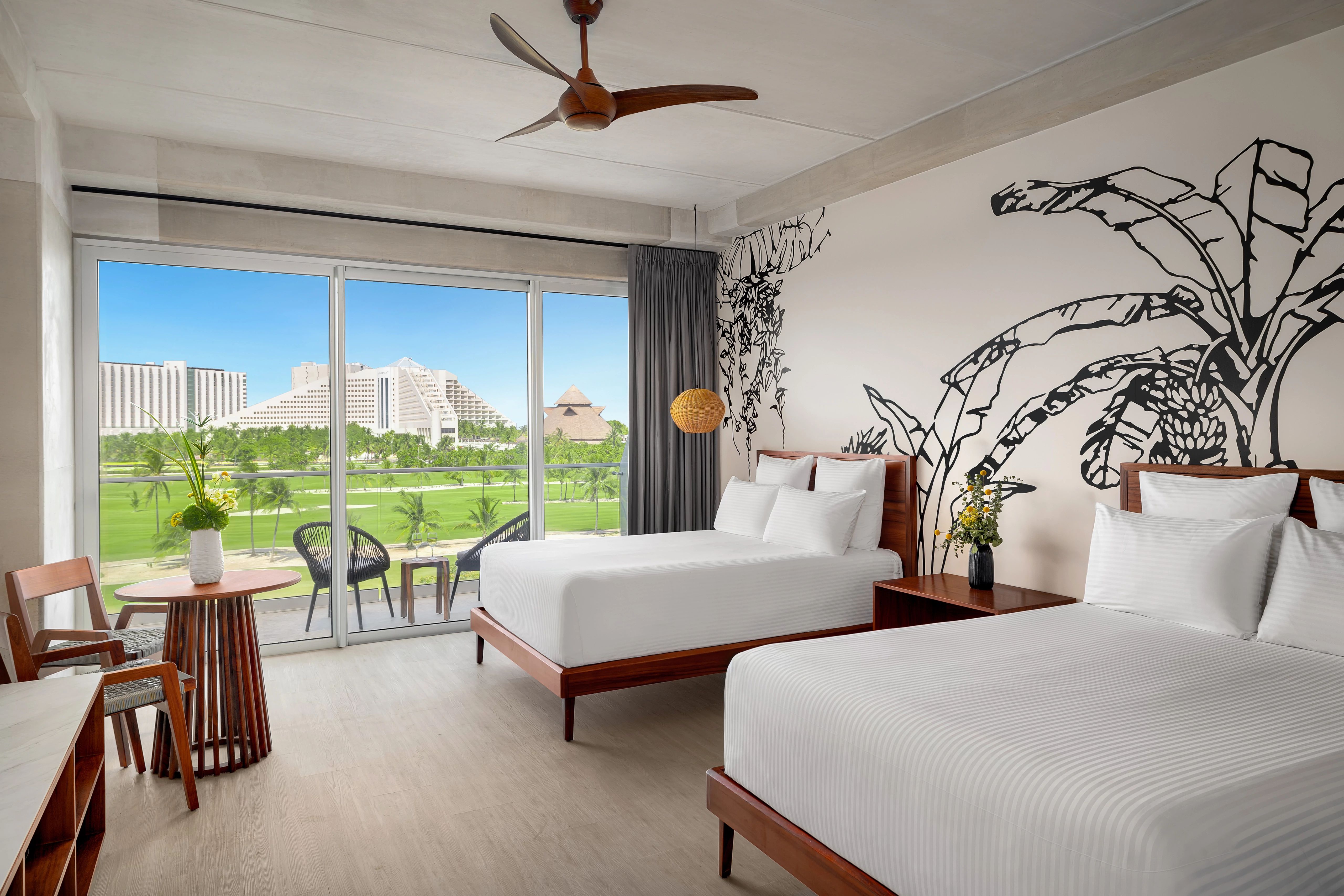 Junior Suite Partial Ocean View Two Double Beds