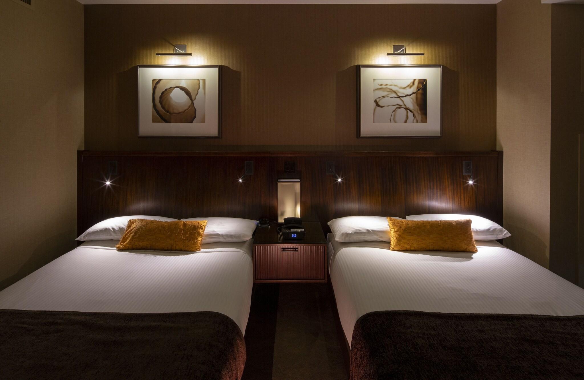 Double Deluxe Two Queen Beds