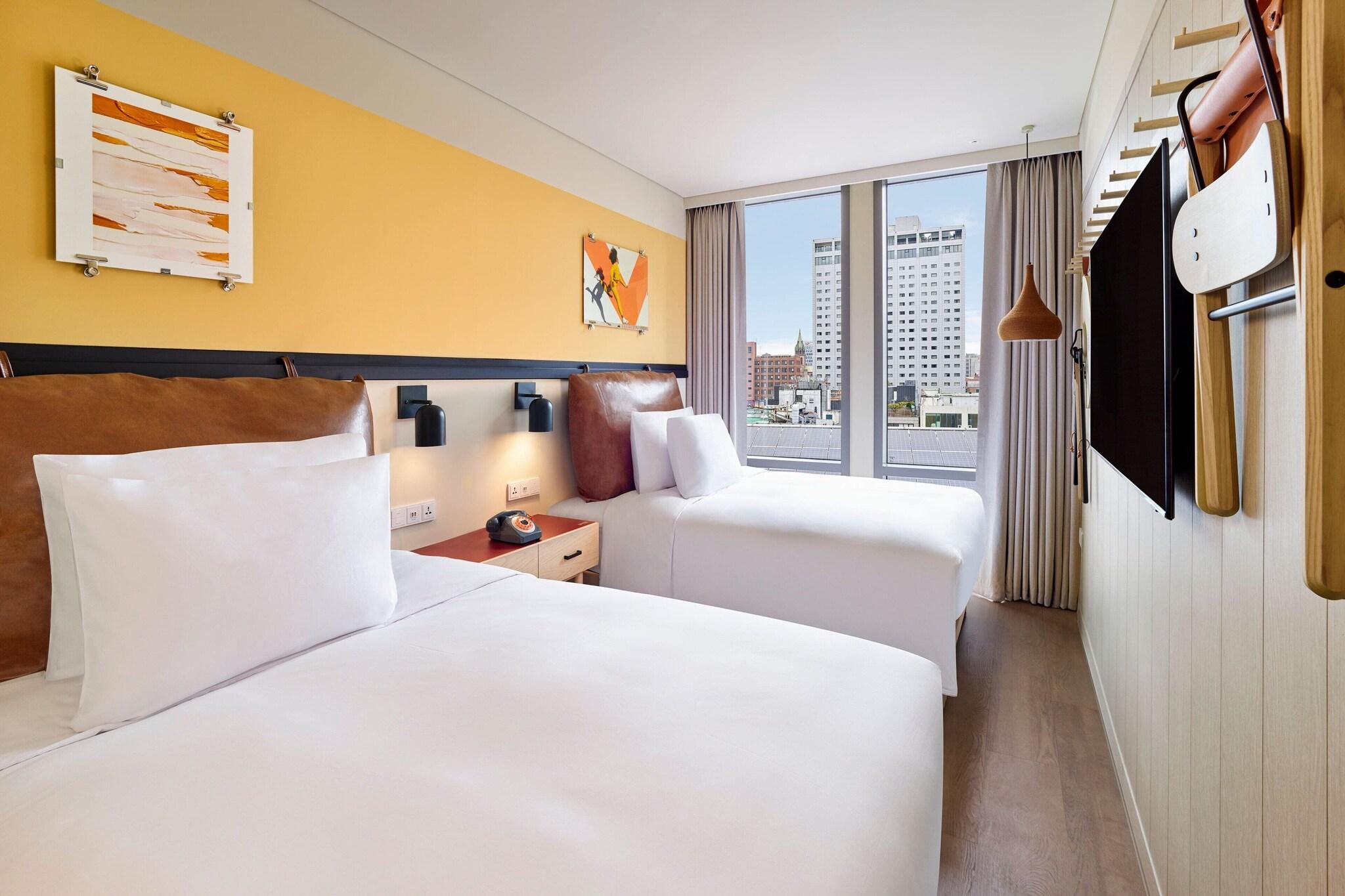 Quadruple City View Two Double Beds