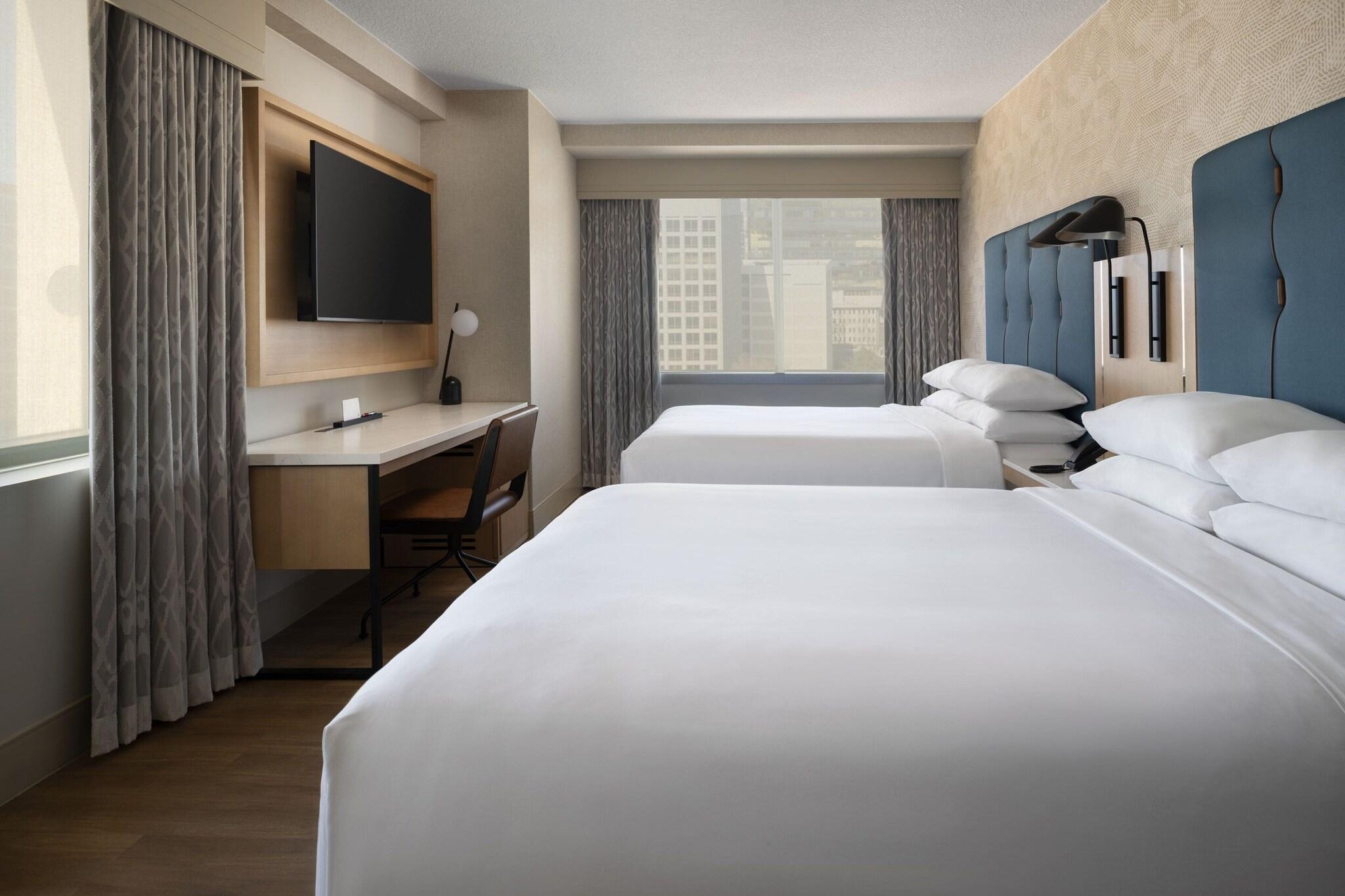 Quadruple Club Two Queen Beds