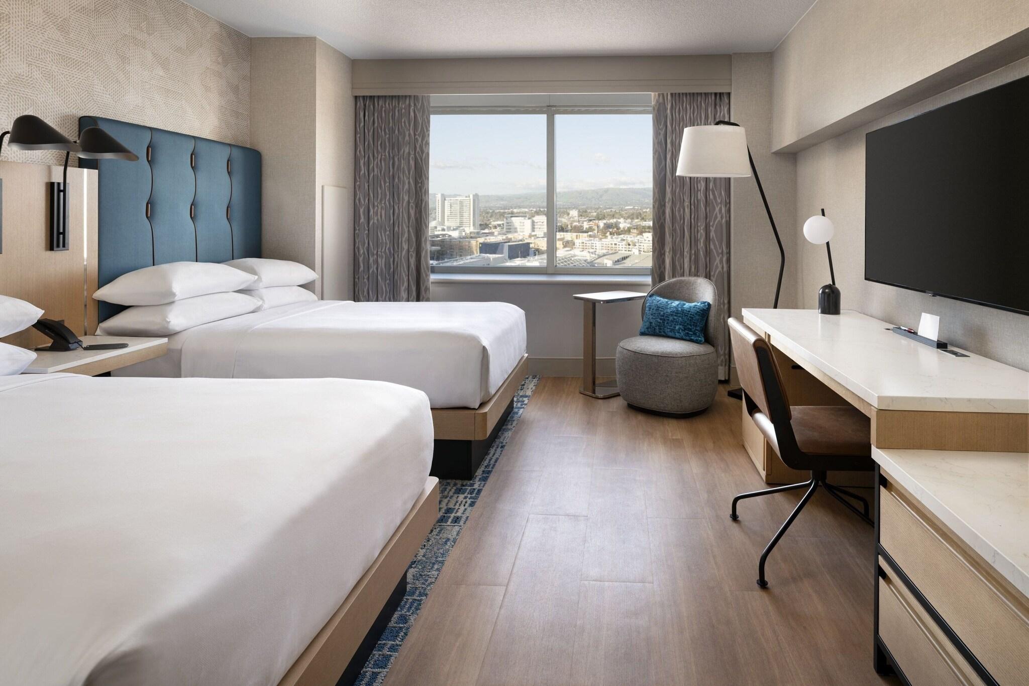 Quadruple Club Two Queen Beds