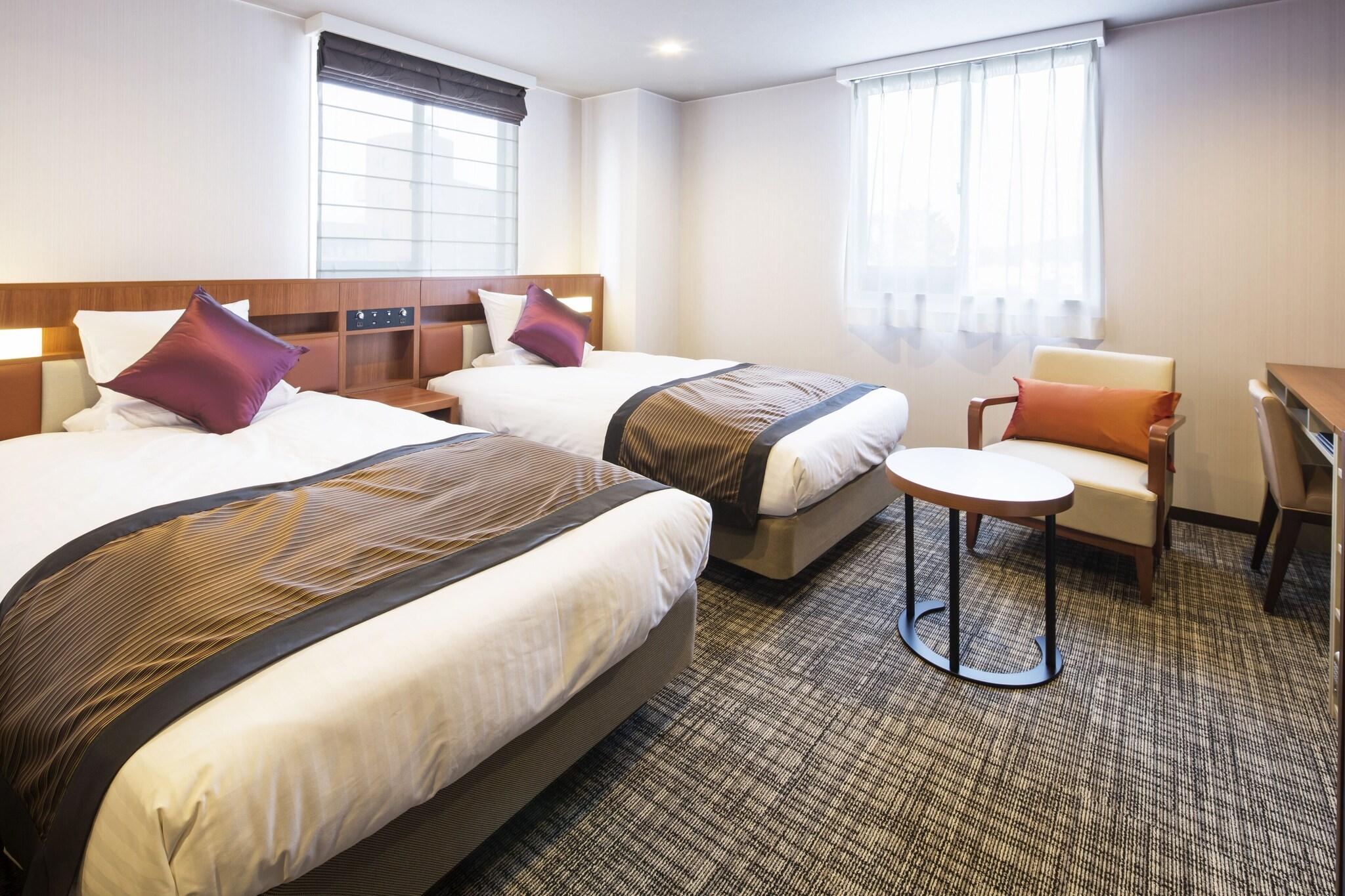 Twin Deluxe Two Beds