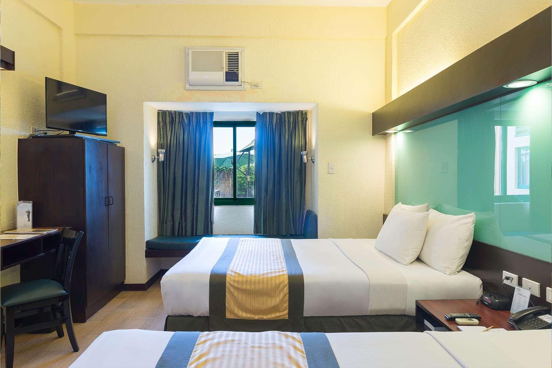 Quadruple Two Queen Beds