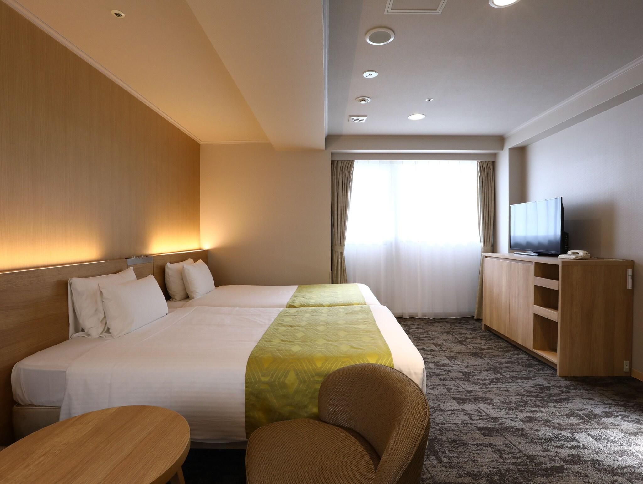 Twin Deluxe Two Beds