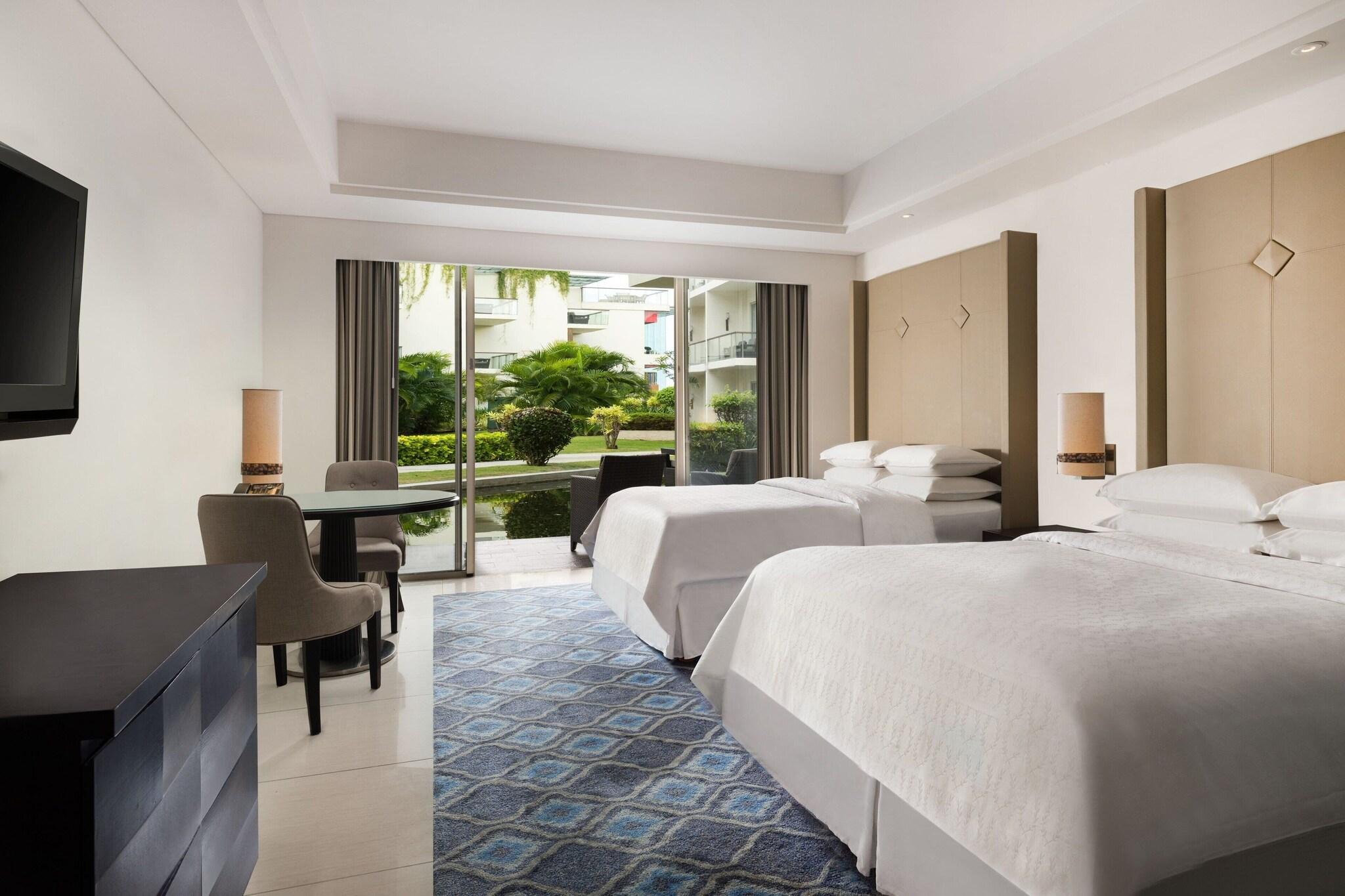 Quadruple Garden View with Balcony