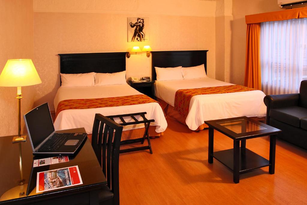 Quadruple Two Queen Beds