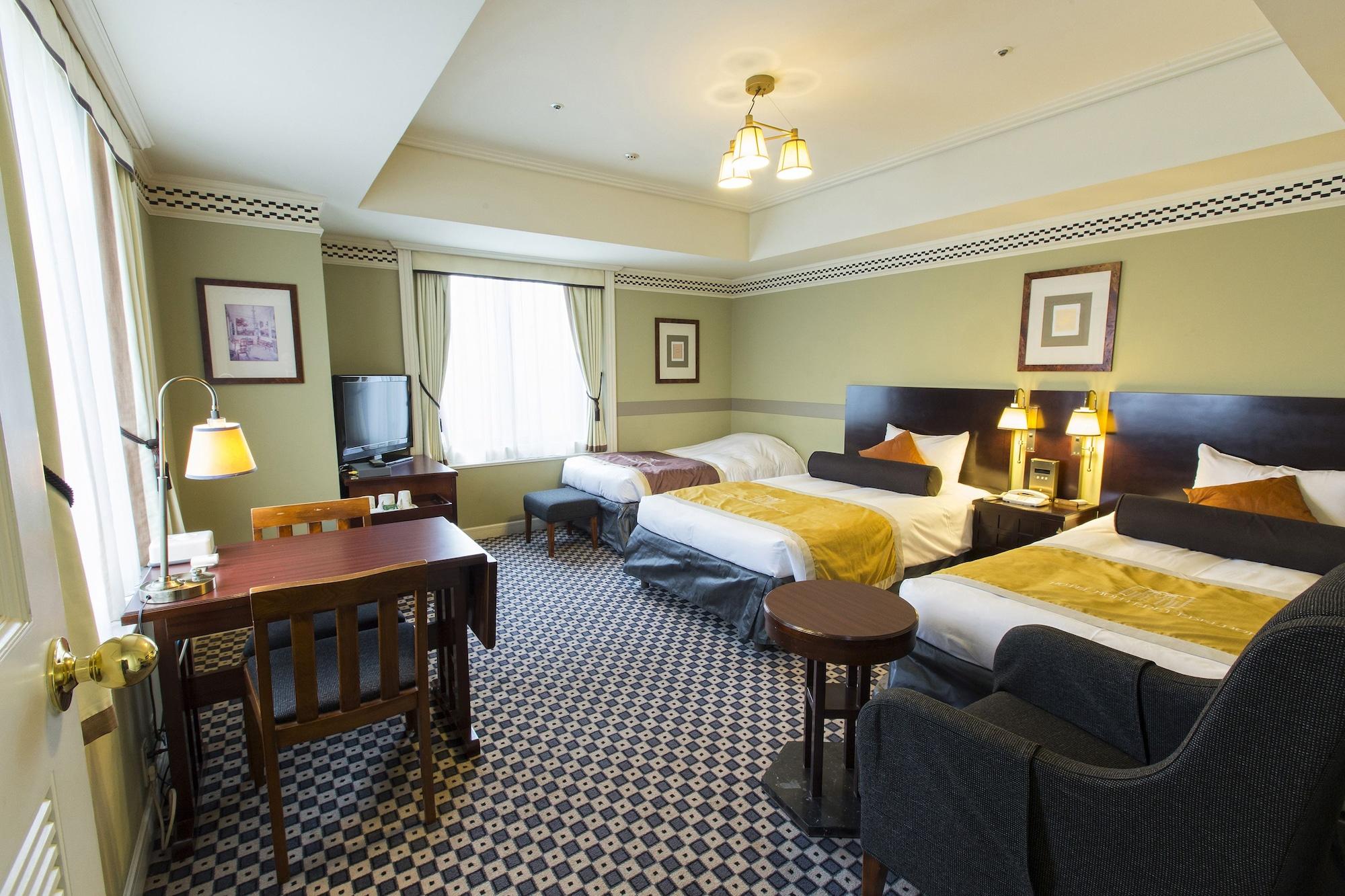 Triple Deluxe Two Beds