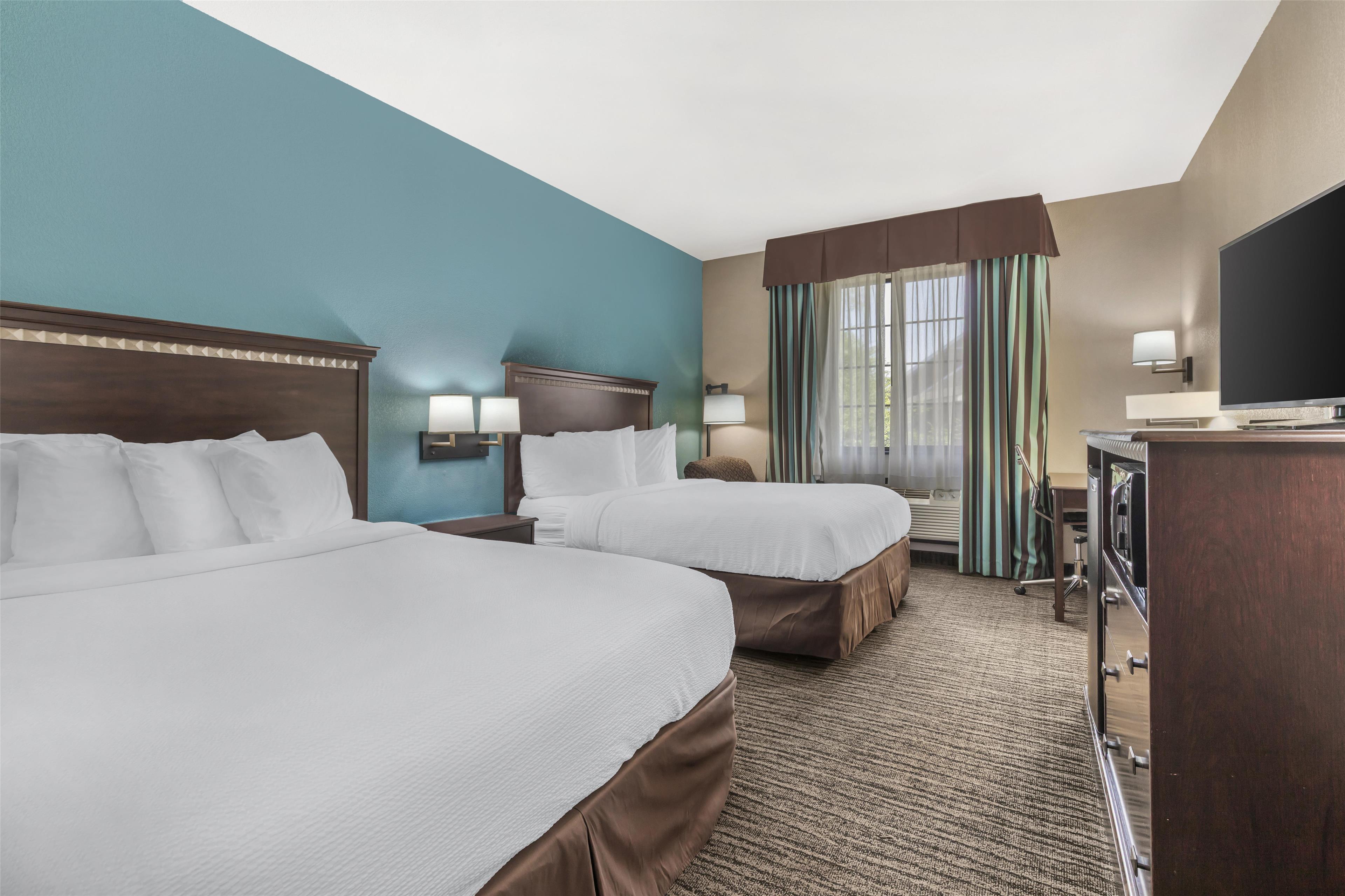 Quadruple Executive Two Queen Beds