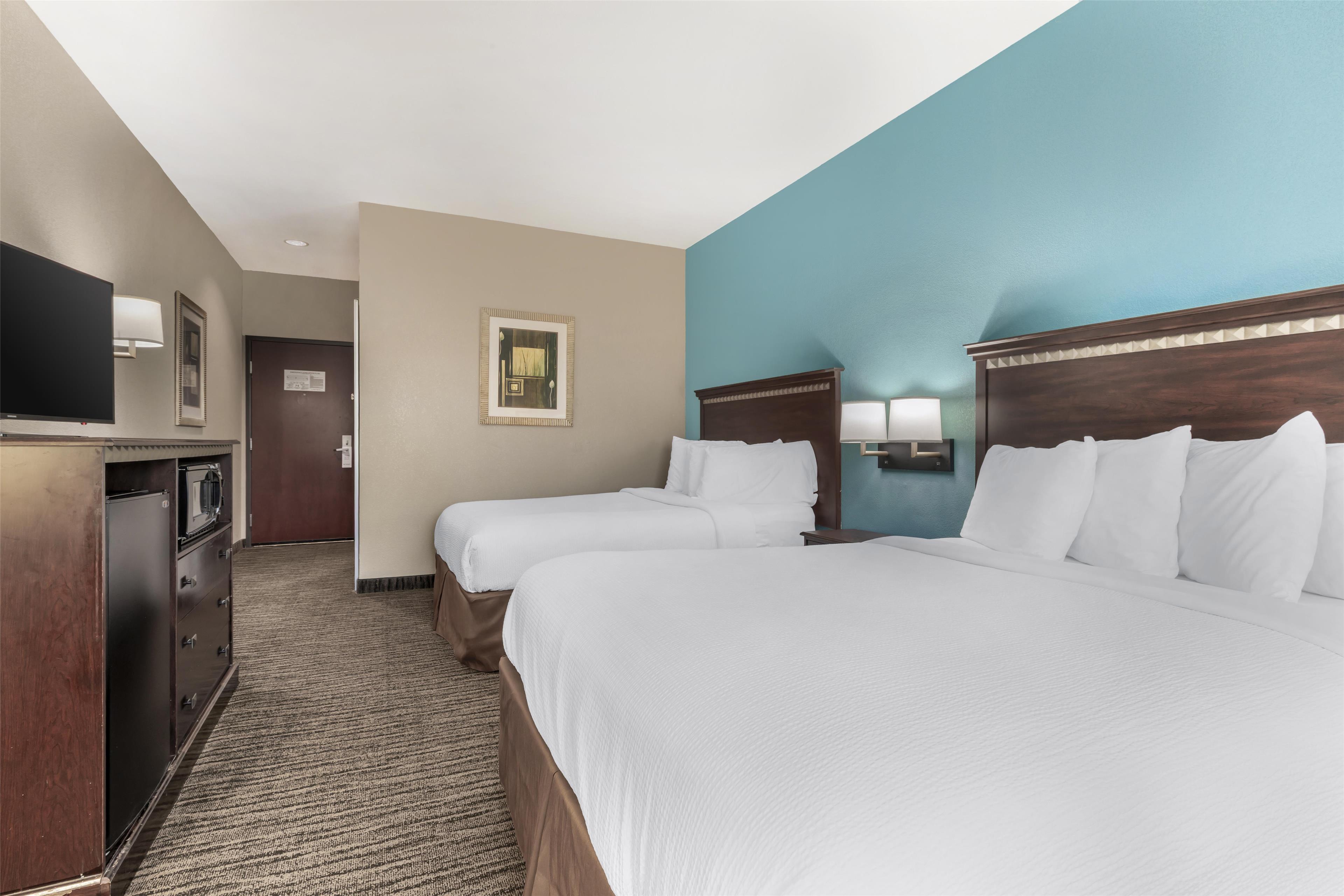 Quadruple Executive Two Queen Beds