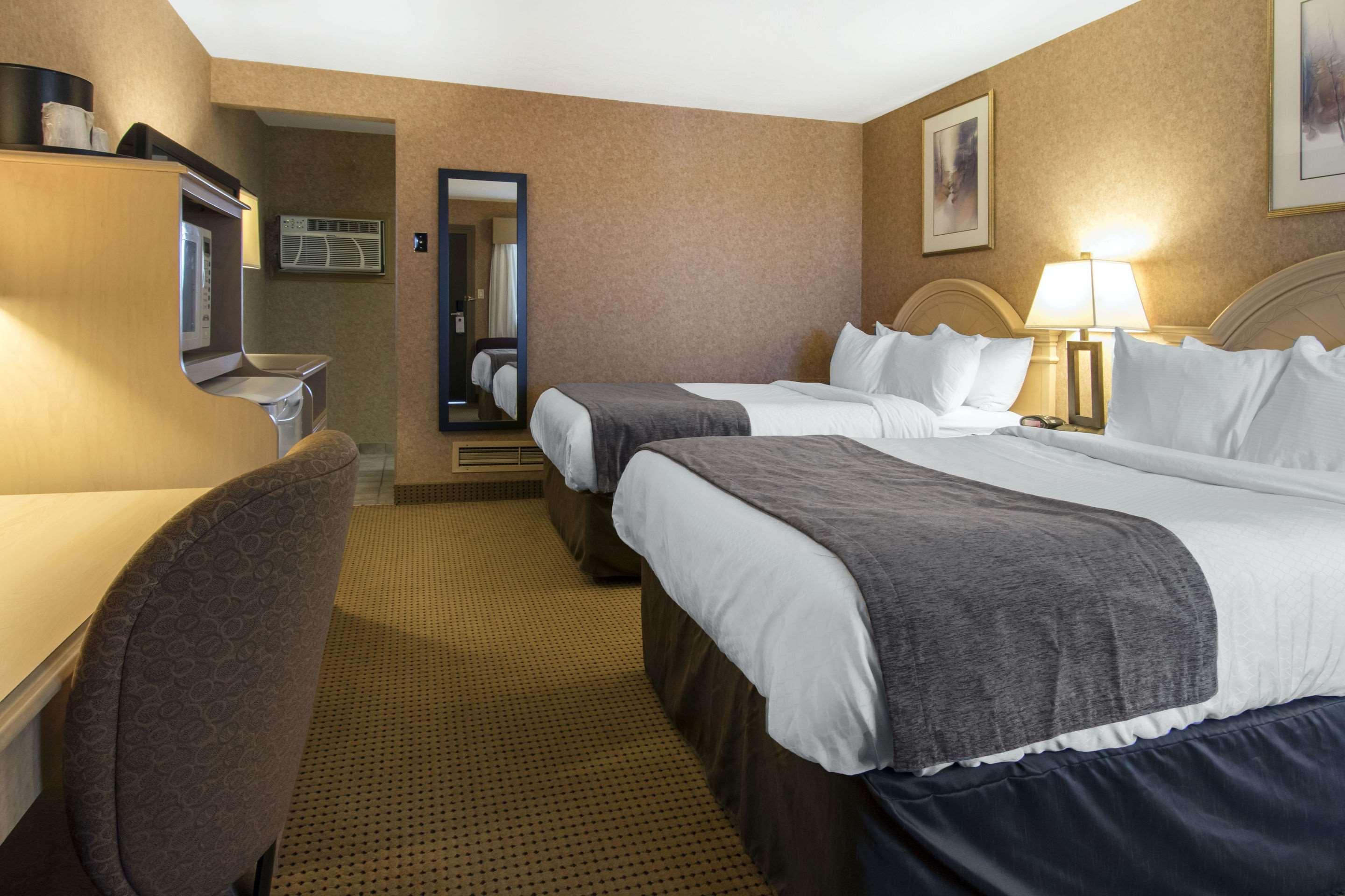 Quadruple Two Queen Beds