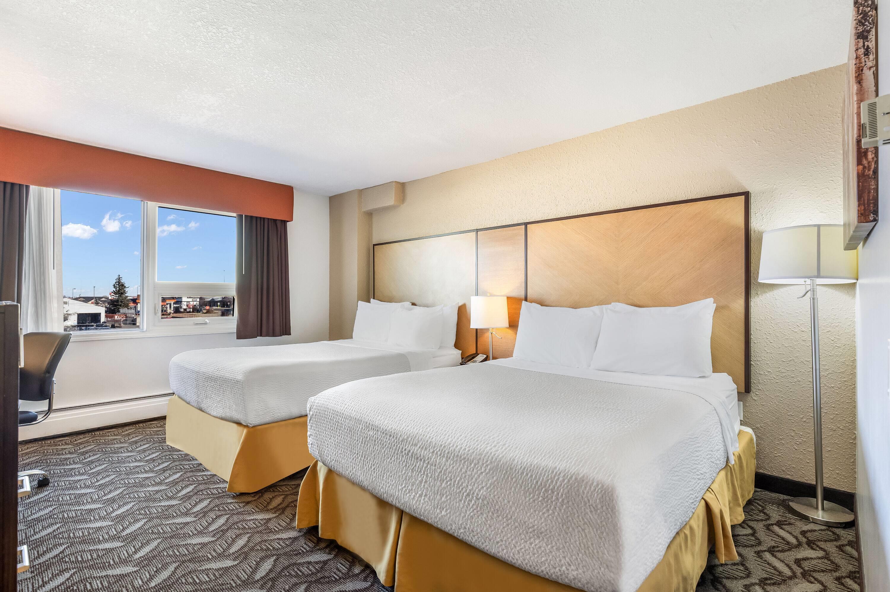 Quadruple Two Queen Beds