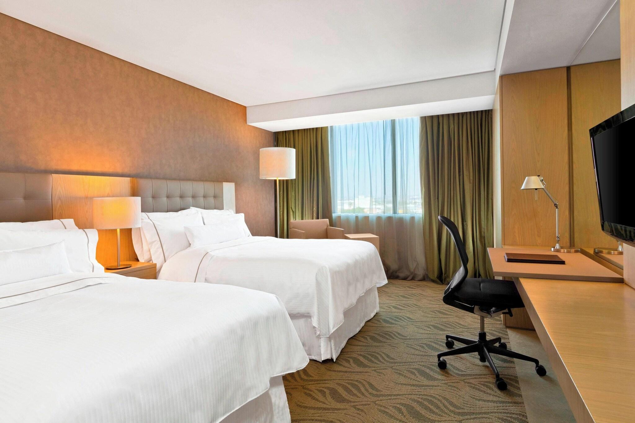 Quadruple Deluxe Two Double Beds