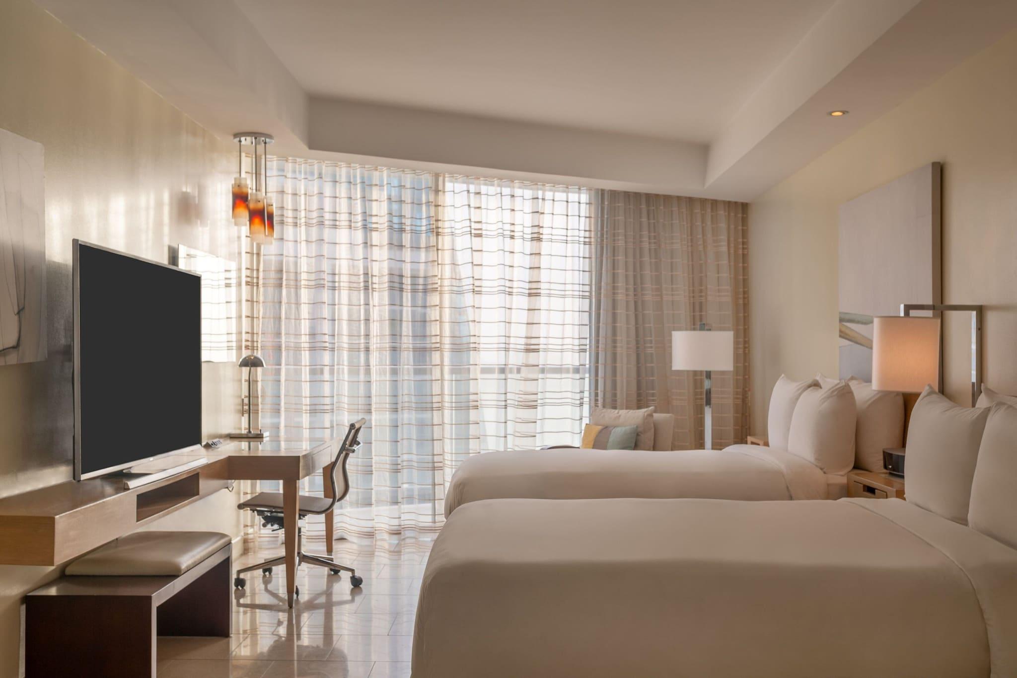 Quadruple Partial Ocean View Two Double Beds