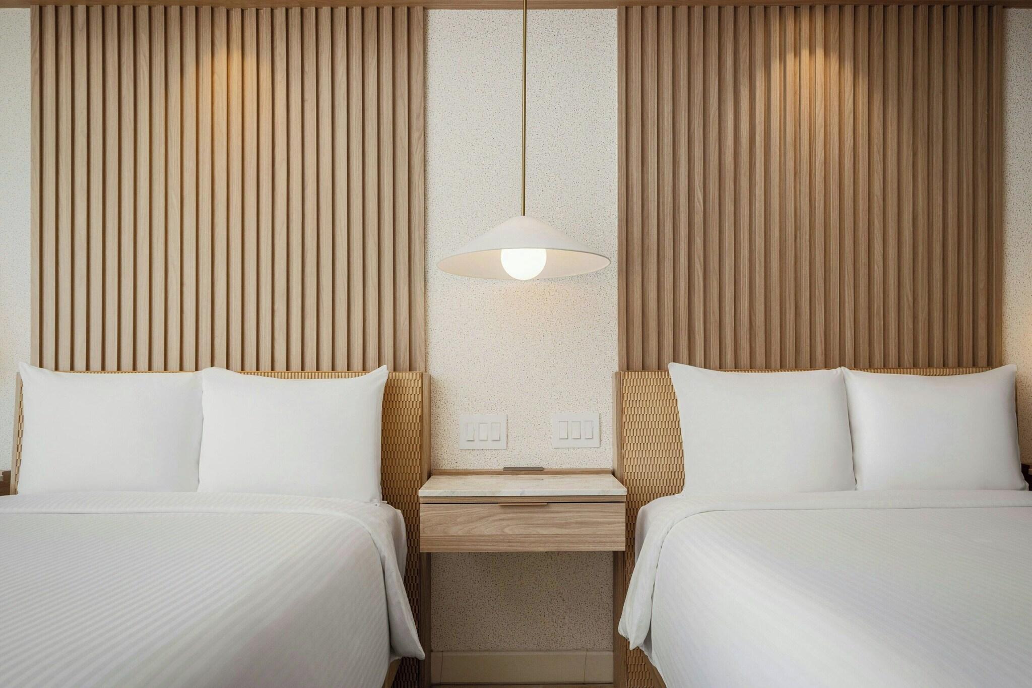 Quadruple Partial Ocean View Two Double Beds