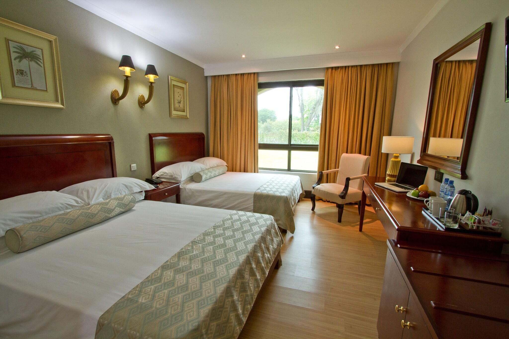 Quadruple Garden View Two Queen Beds