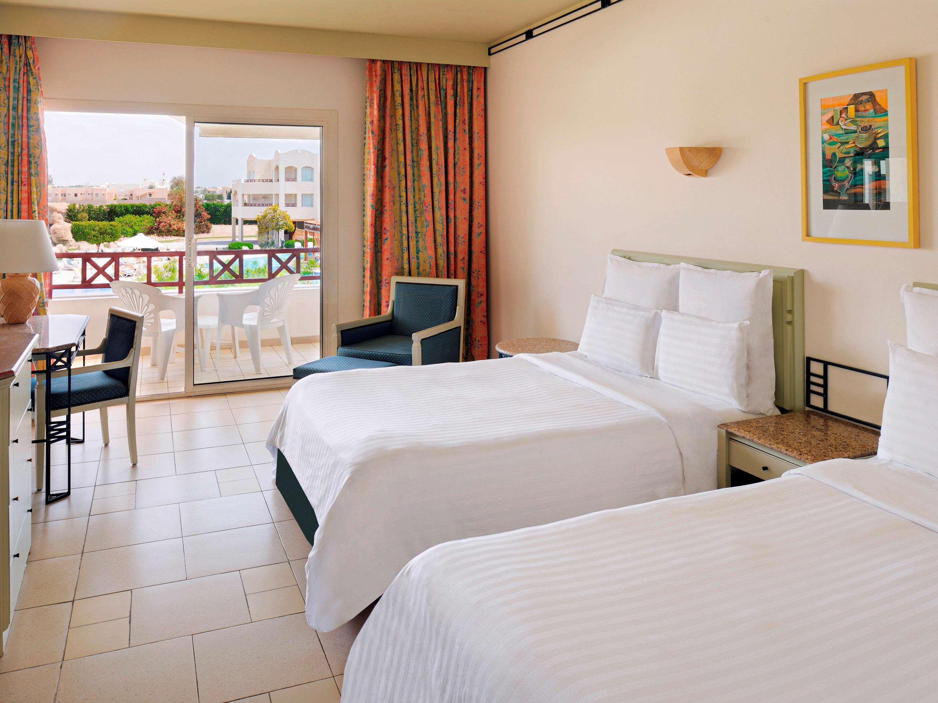 Double Two Queen Beds Pool View