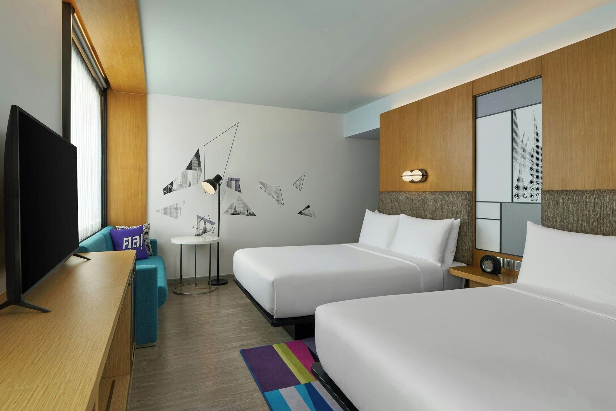 Quadruple City View Two Queen Beds