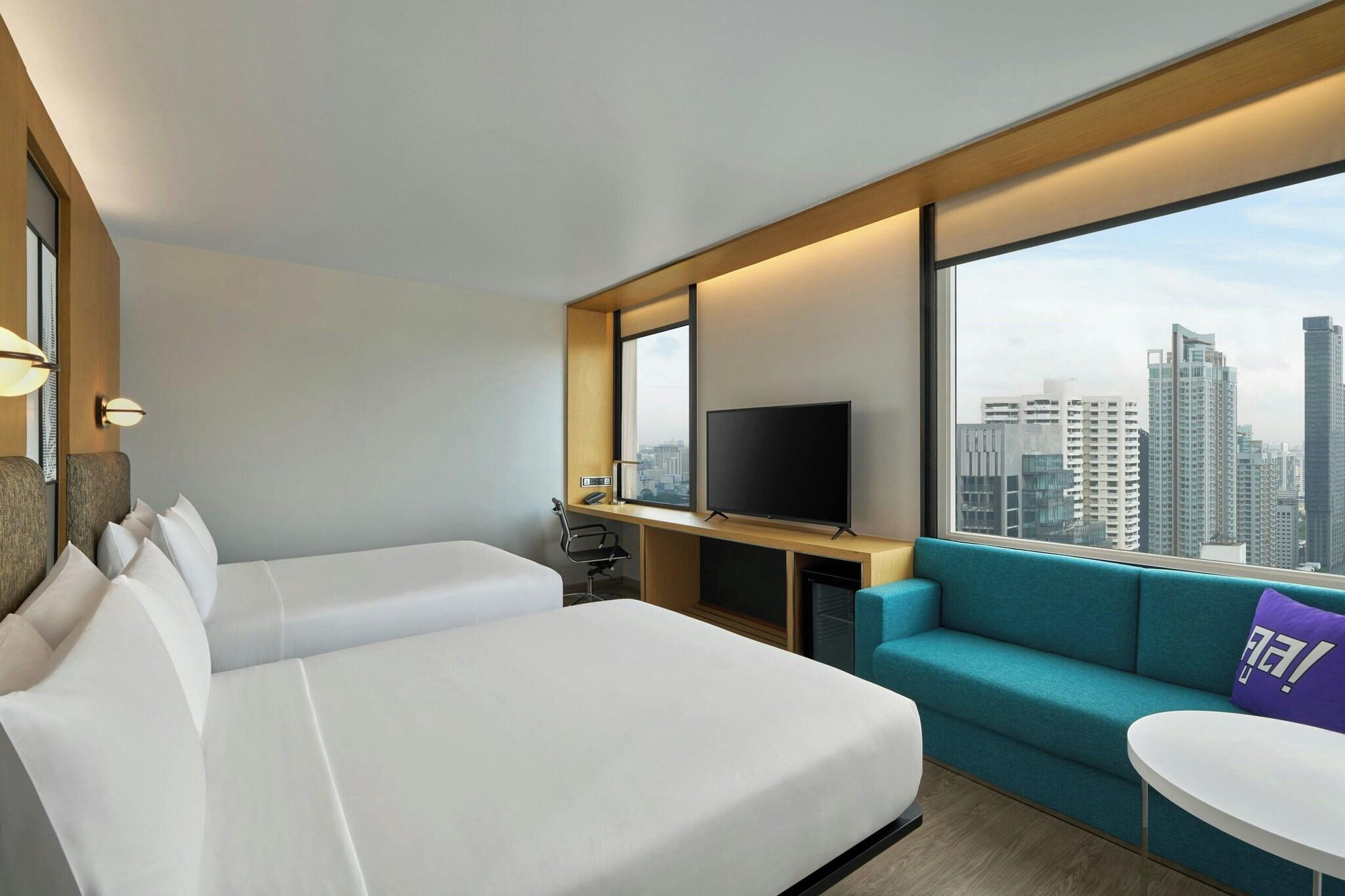 Quadruple City View Two Queen Beds
