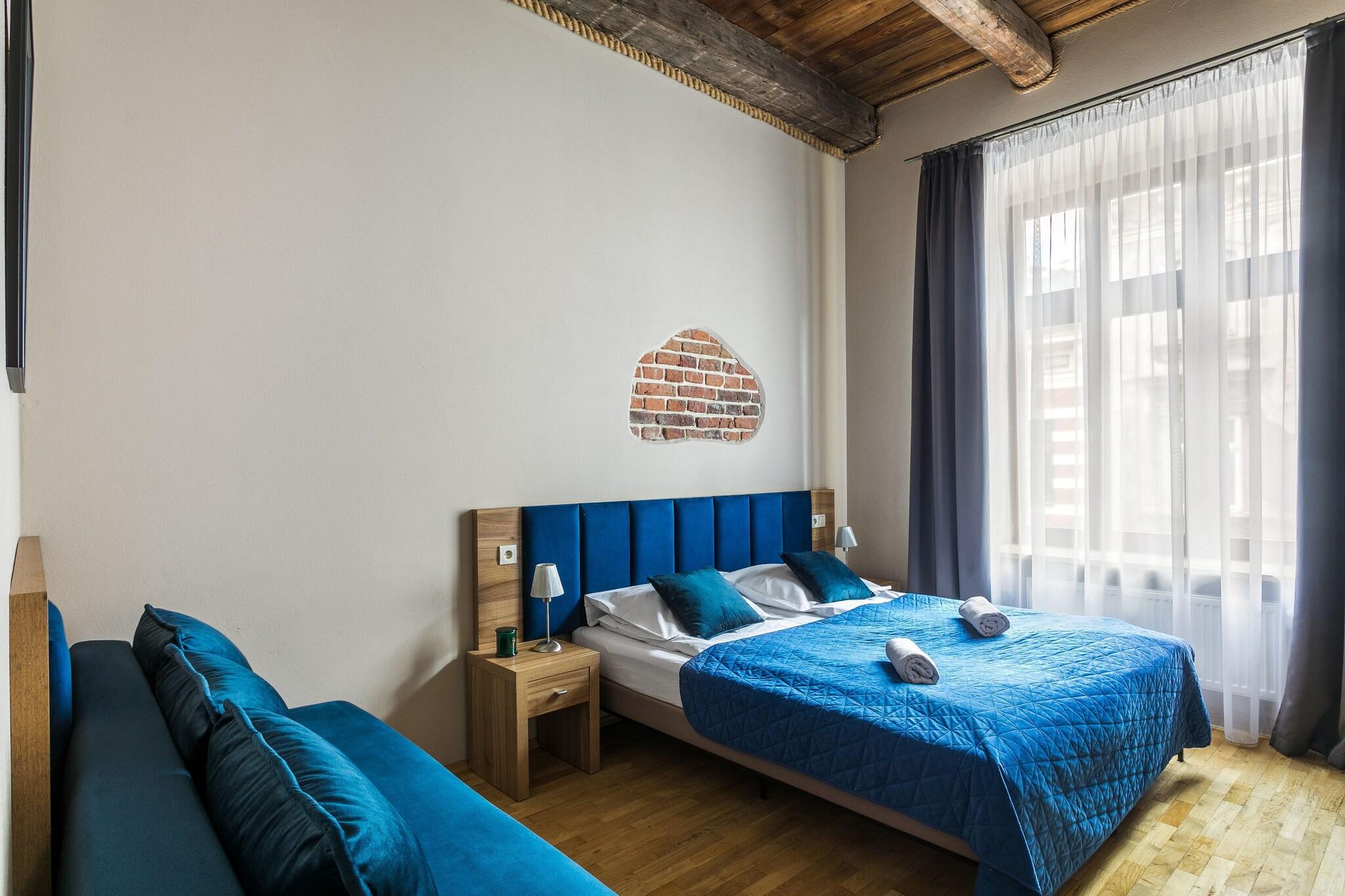 Quadruple Deluxe Queen Bed