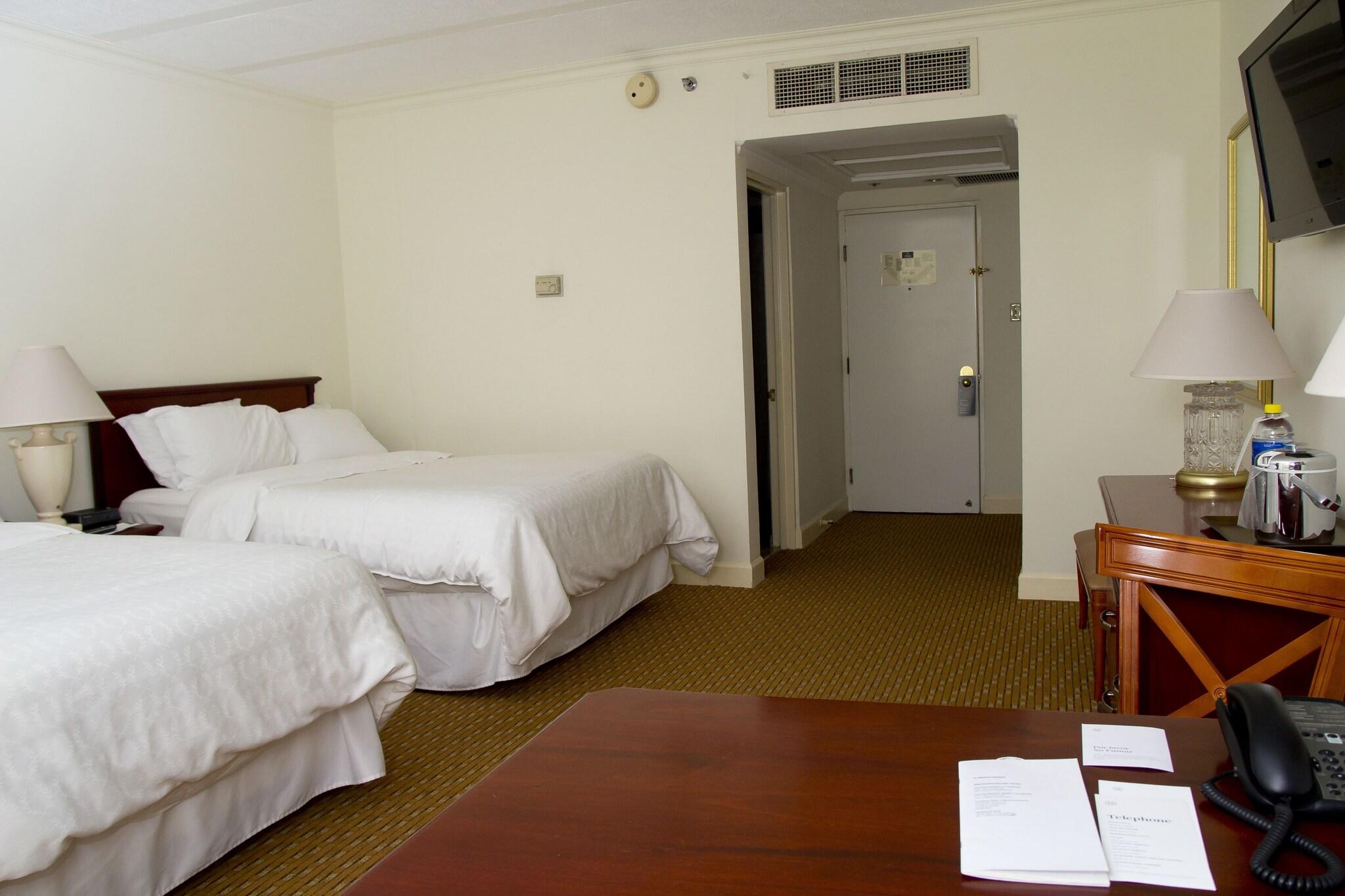 Quadruple Club Two Queen Beds