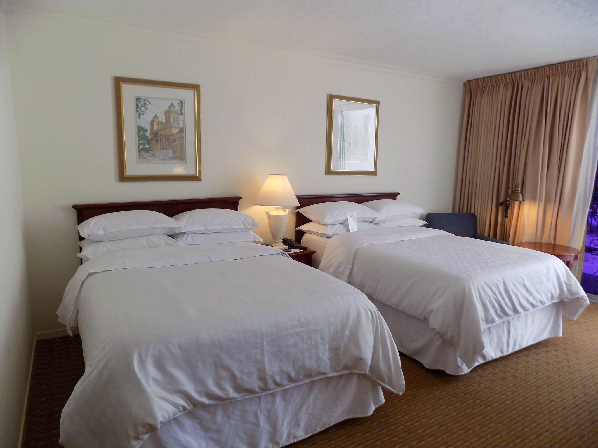 Quadruple Club Two Queen Beds