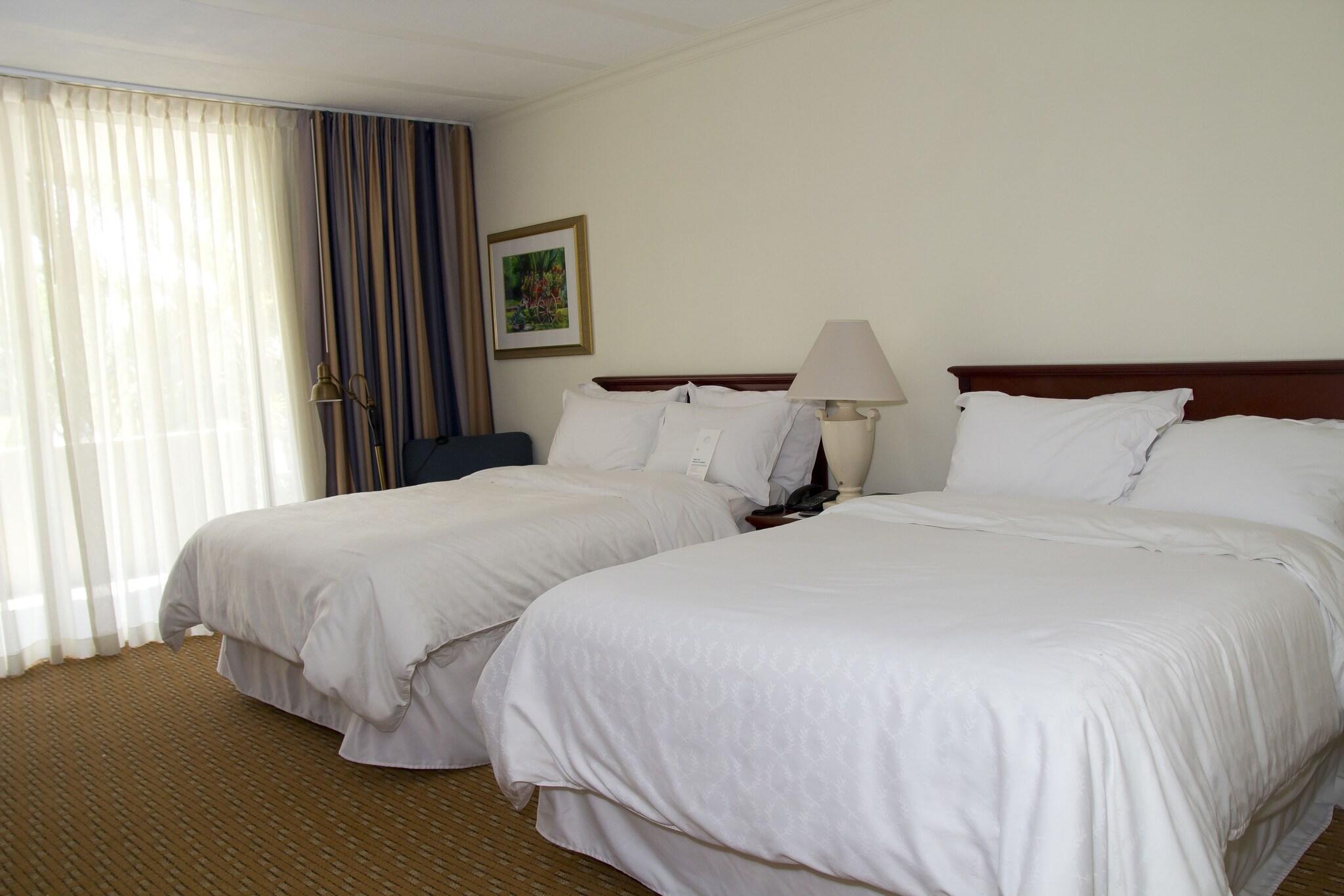 Quadruple Club Two Queen Beds