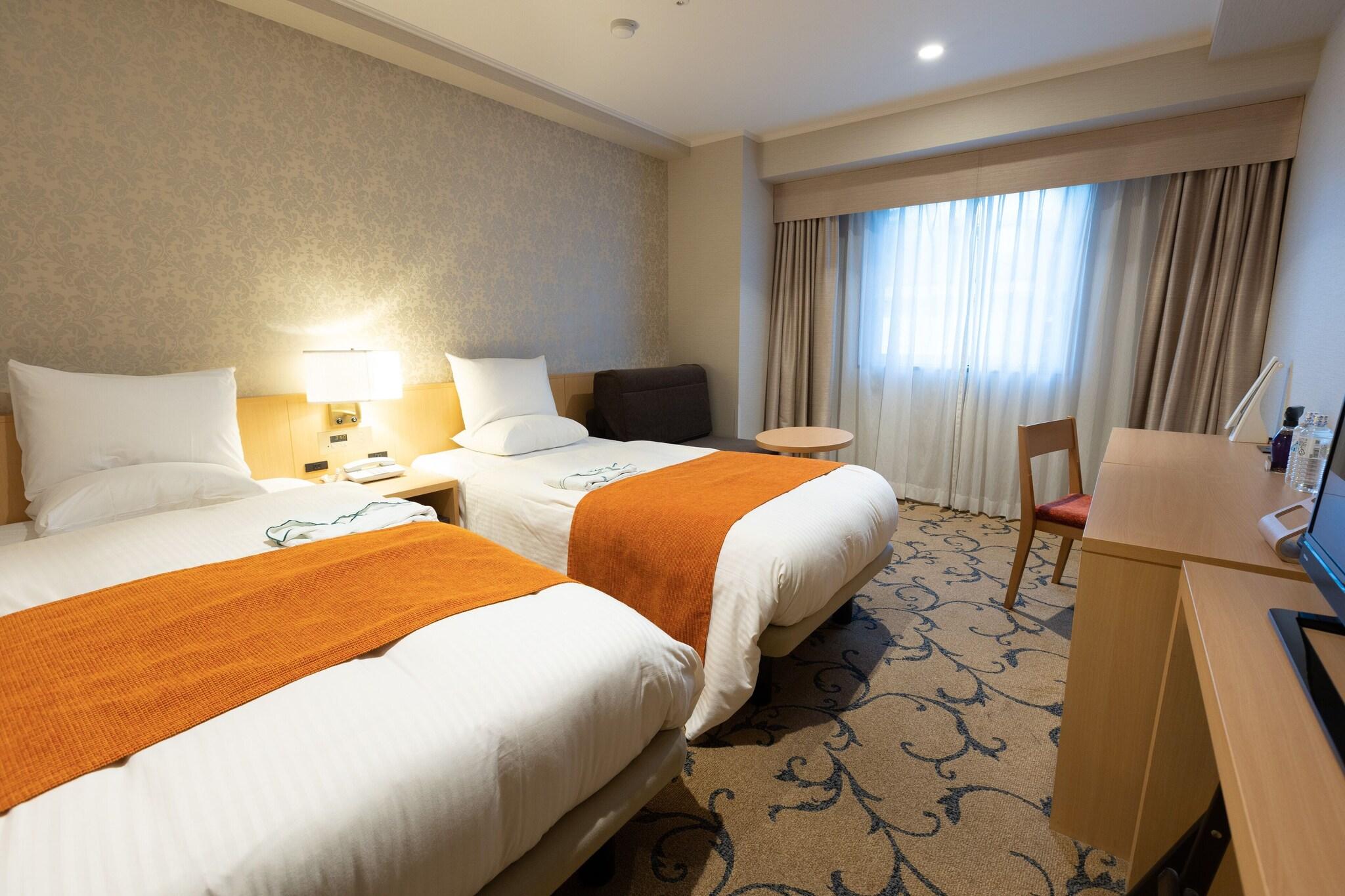 Twin Deluxe Two Beds