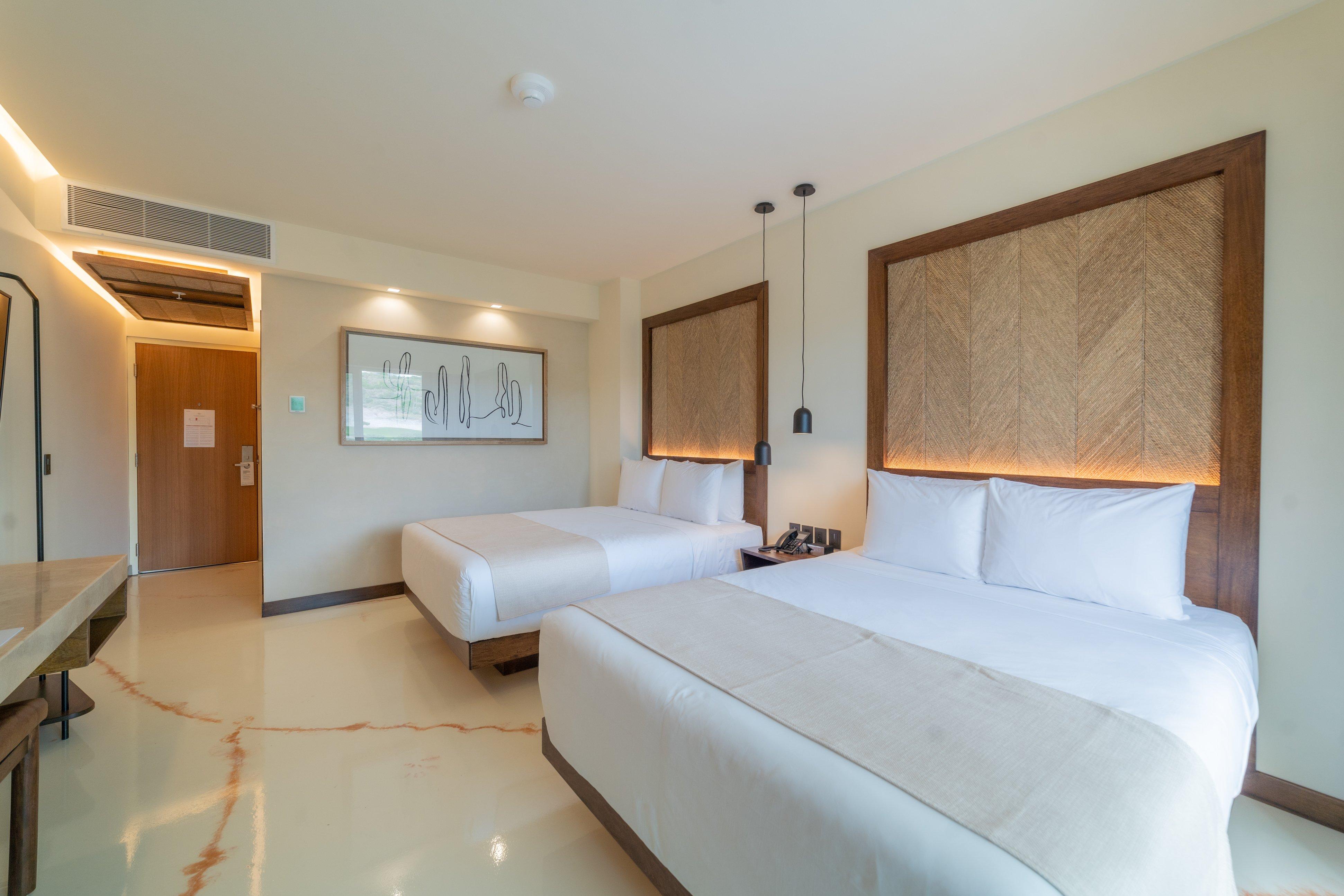 Quadruple Garden View Two Queen Beds