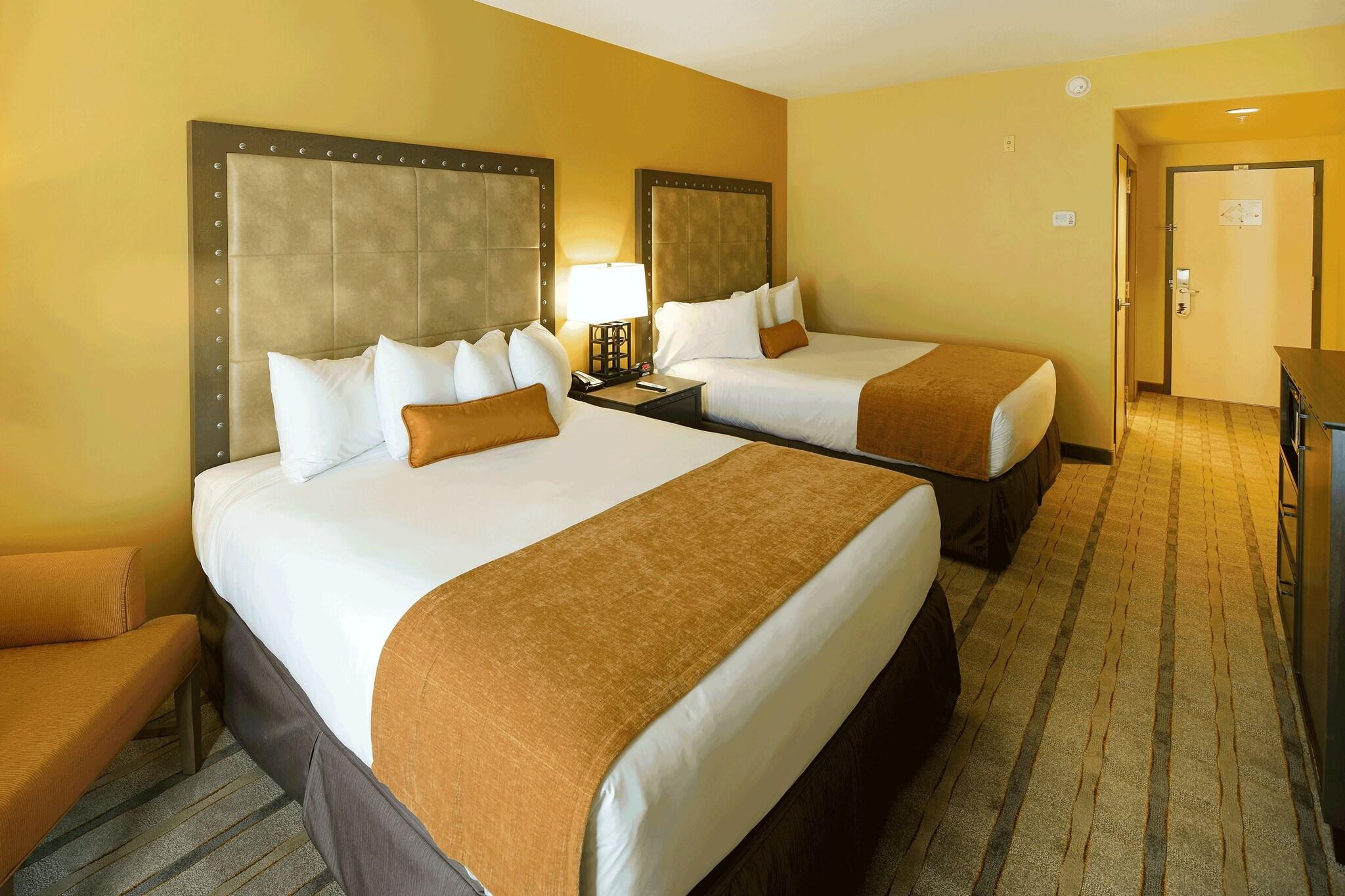 Quadruple Deluxe Two Queen Beds