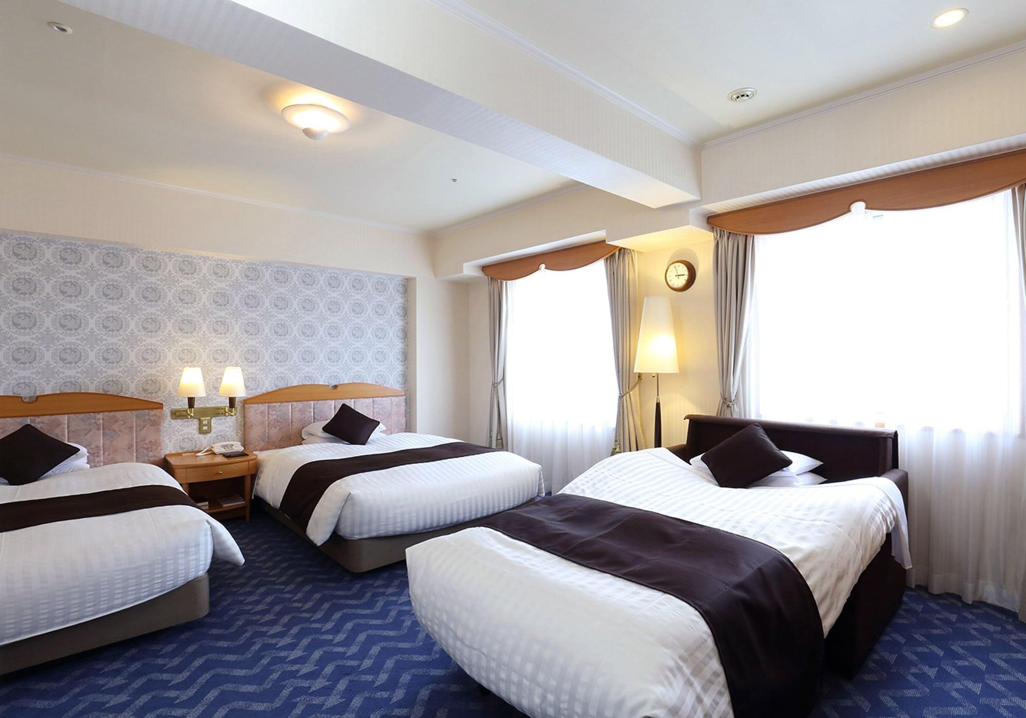 Triple Superior Two Double Beds