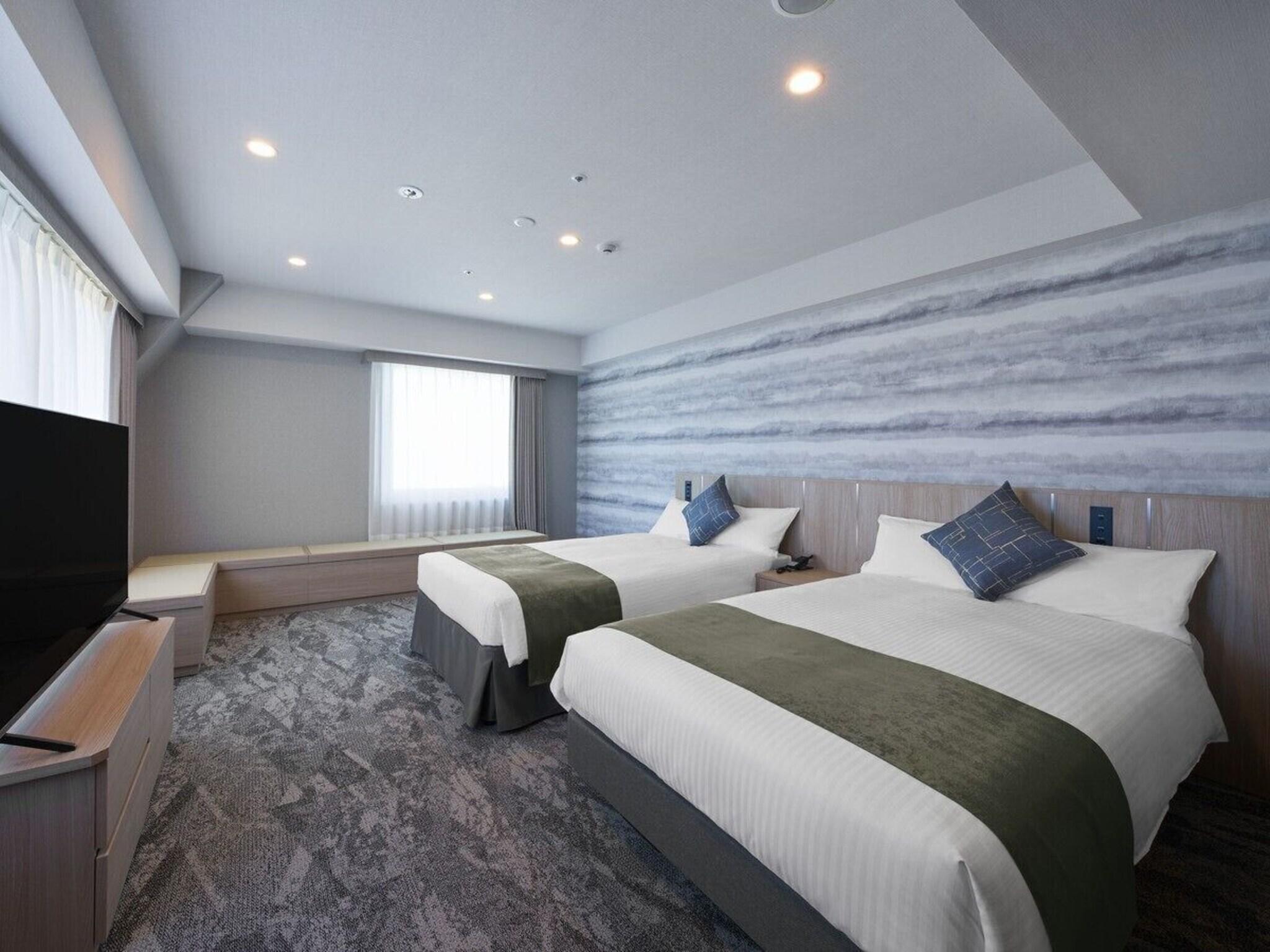 Twin Deluxe Two Beds