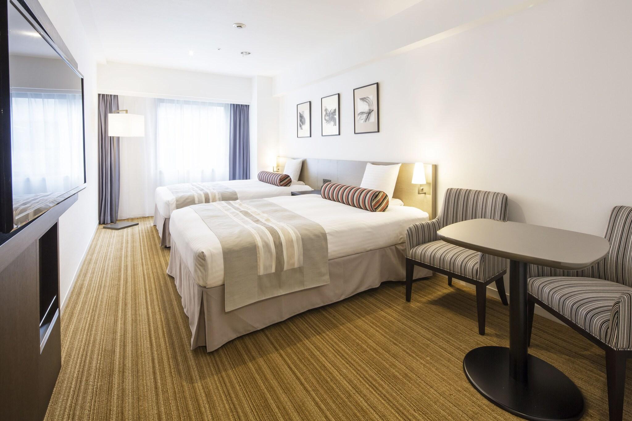 Twin Deluxe Two Double Beds