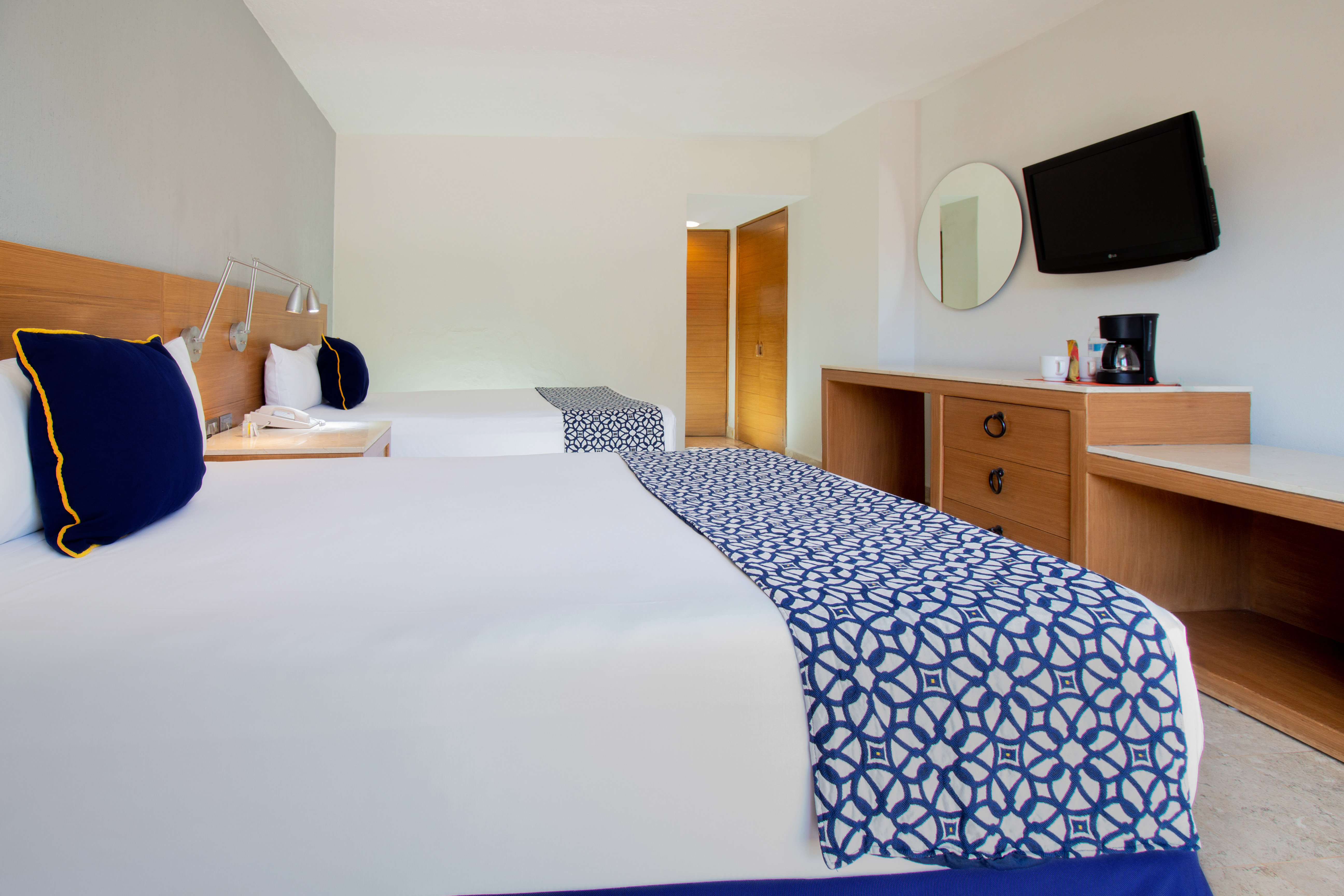 Triple Superior Two Double Beds