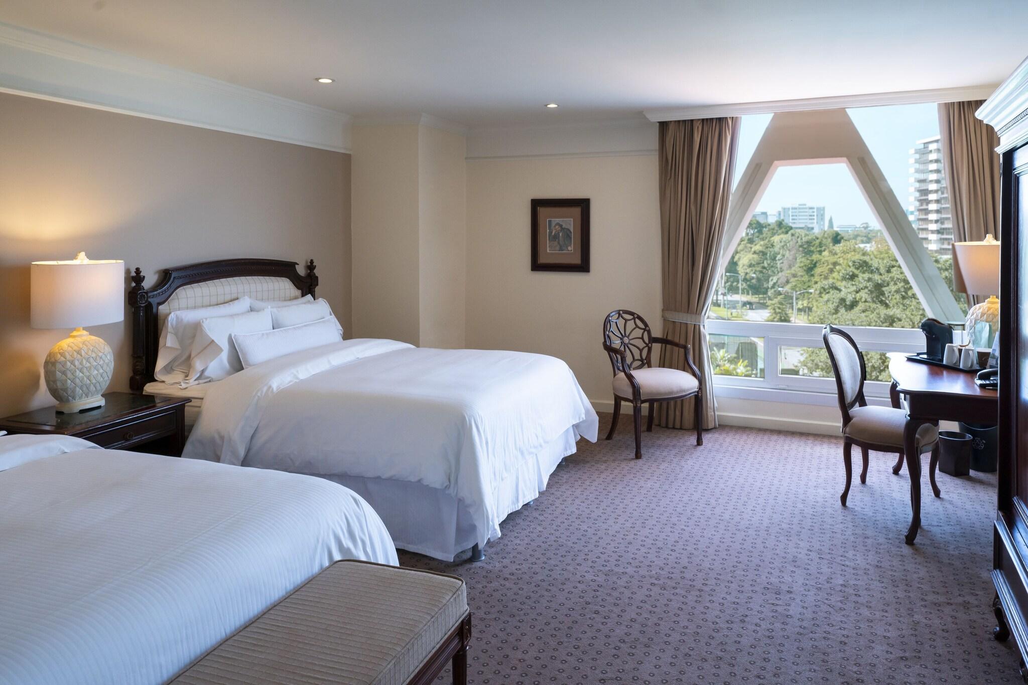 Quadruple Deluxe Two Queen Beds