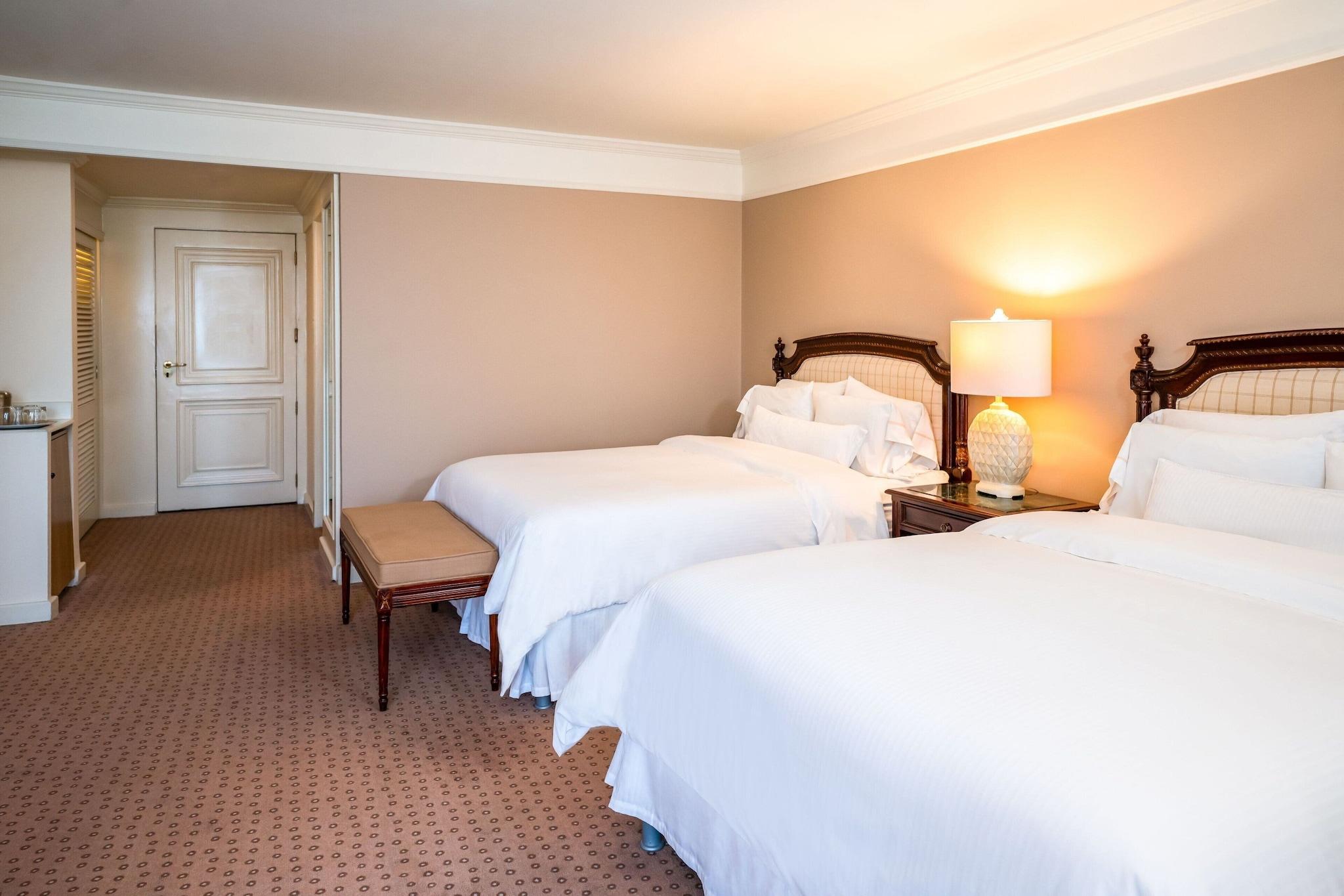 Quadruple Deluxe Two Queen Beds