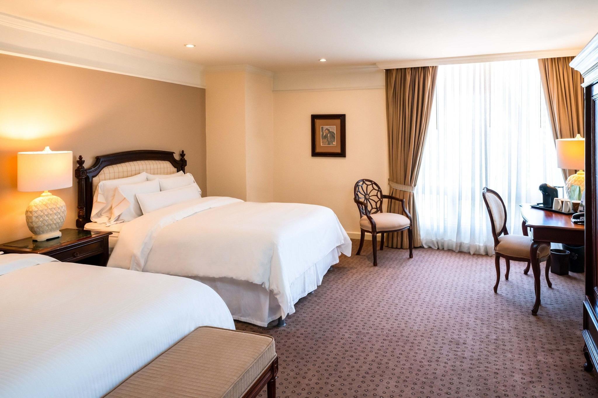 Quadruple Deluxe Two Queen Beds