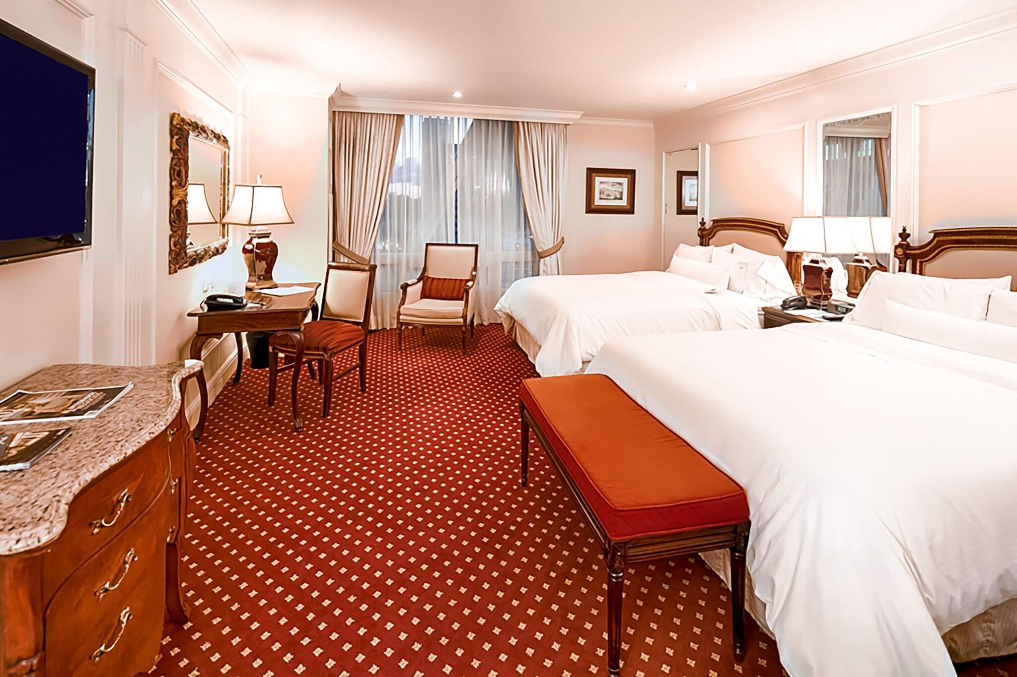 Quadruple Executive Two Queen Beds