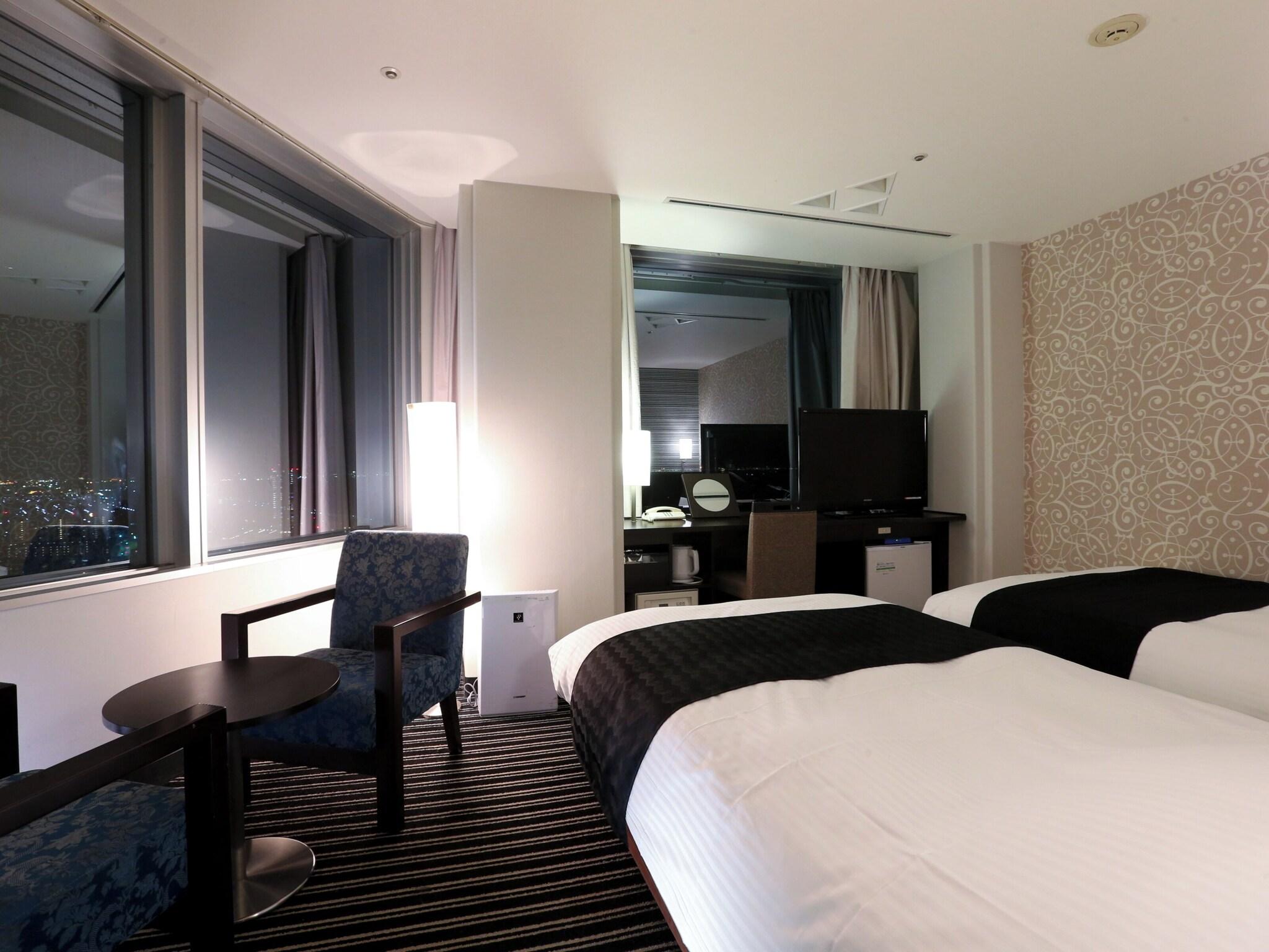 Twin Deluxe Two Beds