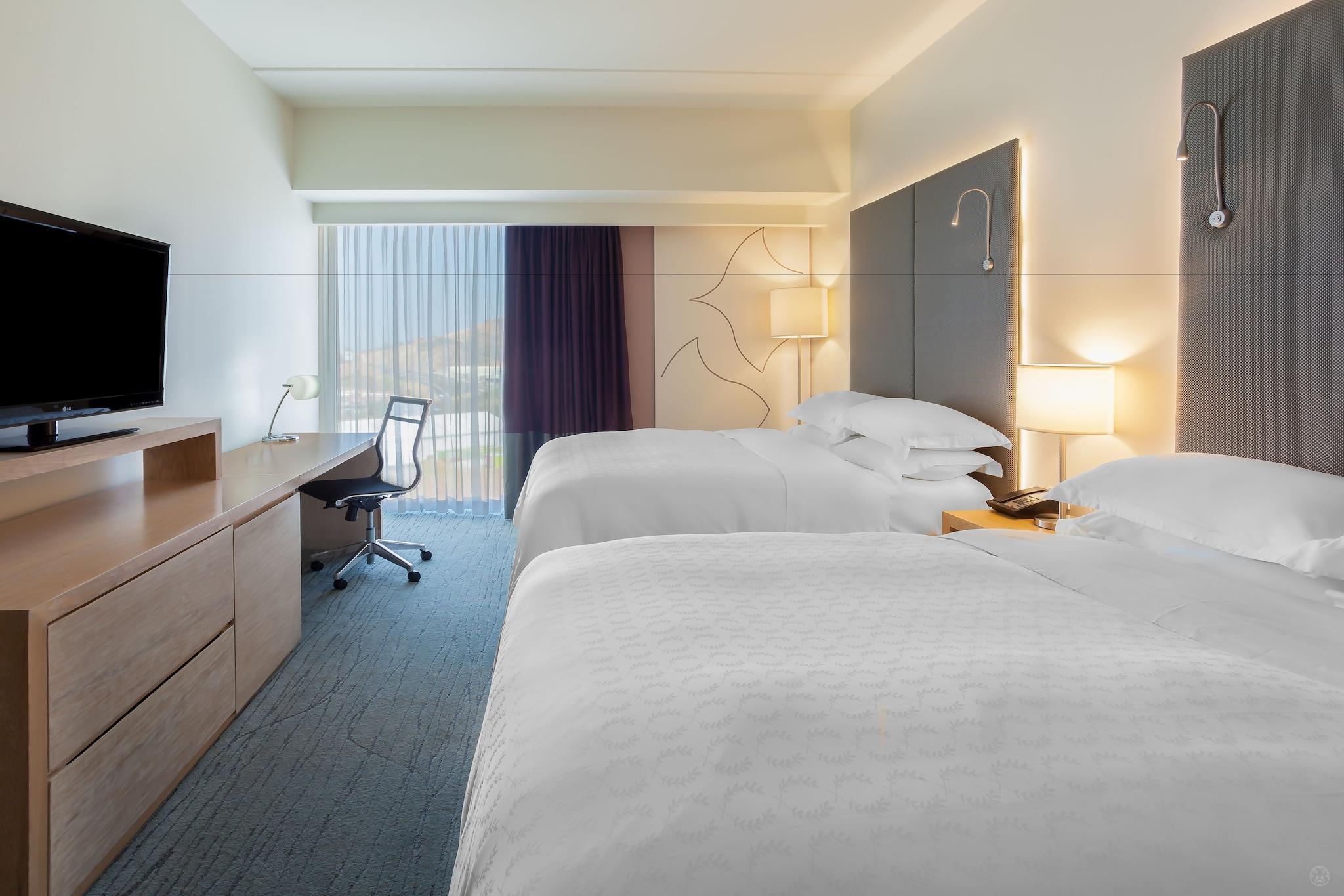 Quadruple Two Queen Beds