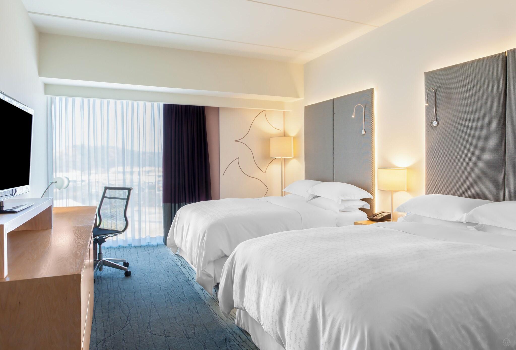 Quadruple City View Two Queen Beds