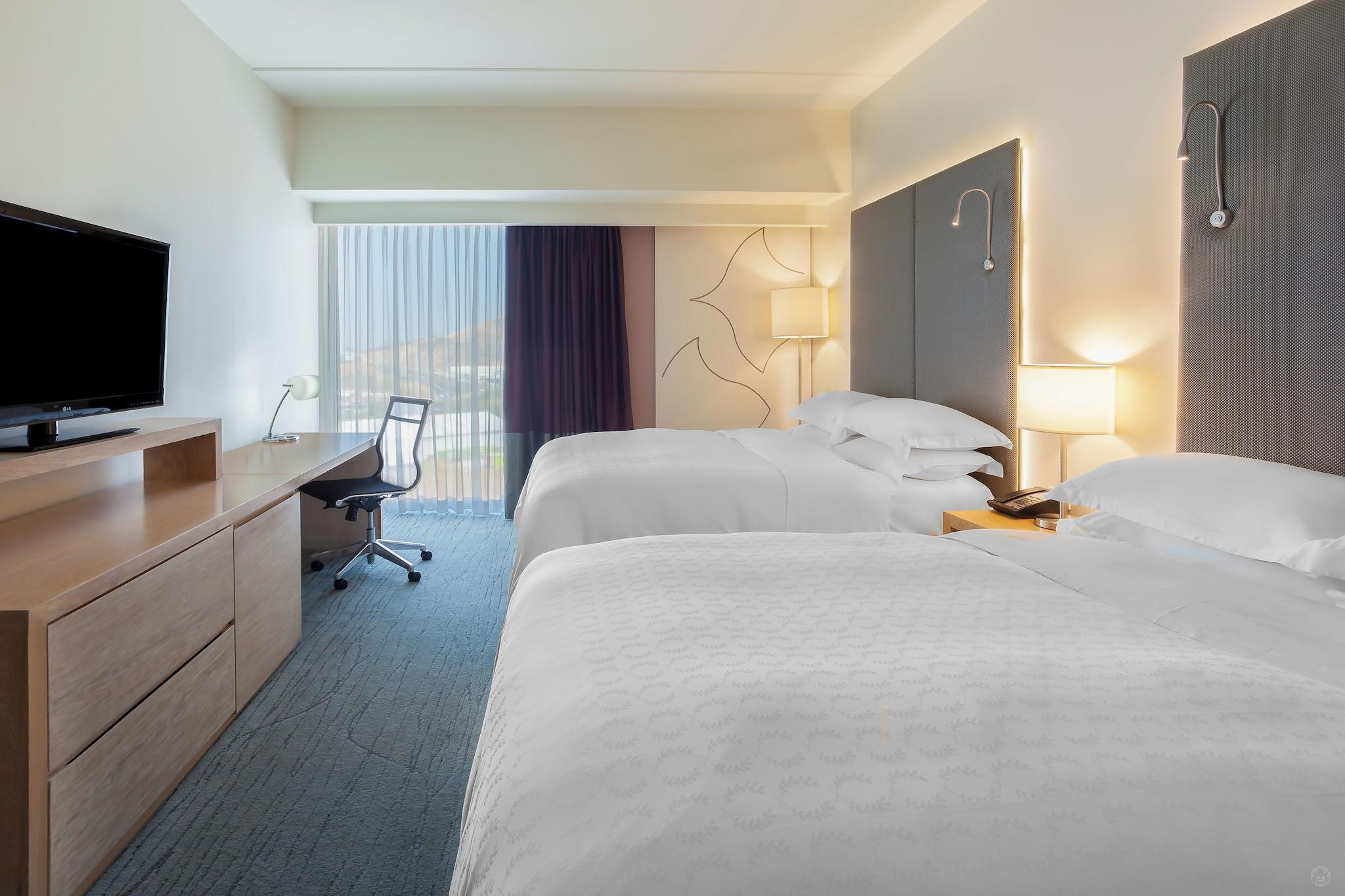 Quadruple City View Two Queen Beds