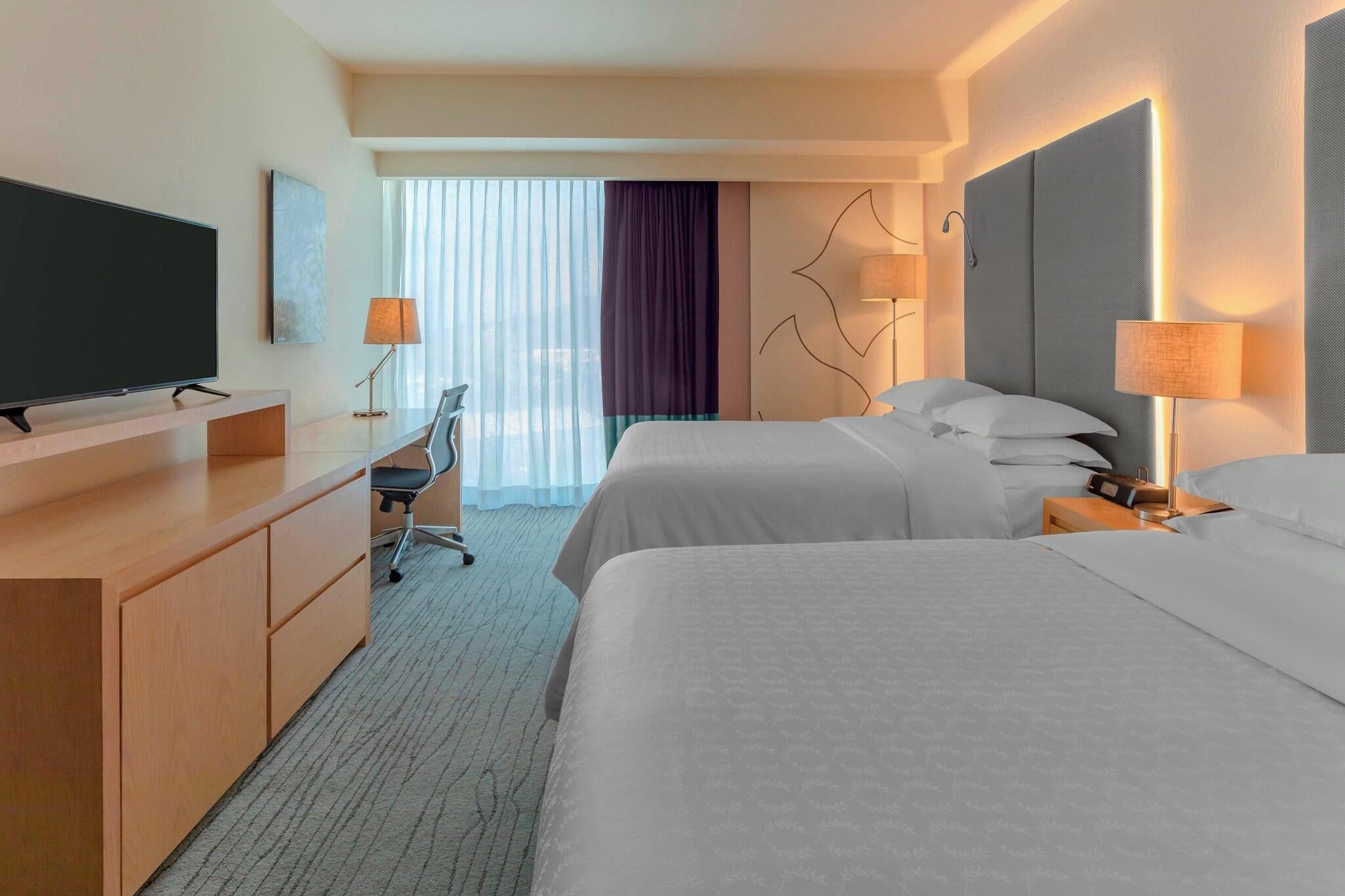 Quadruple City View Two Queen Beds