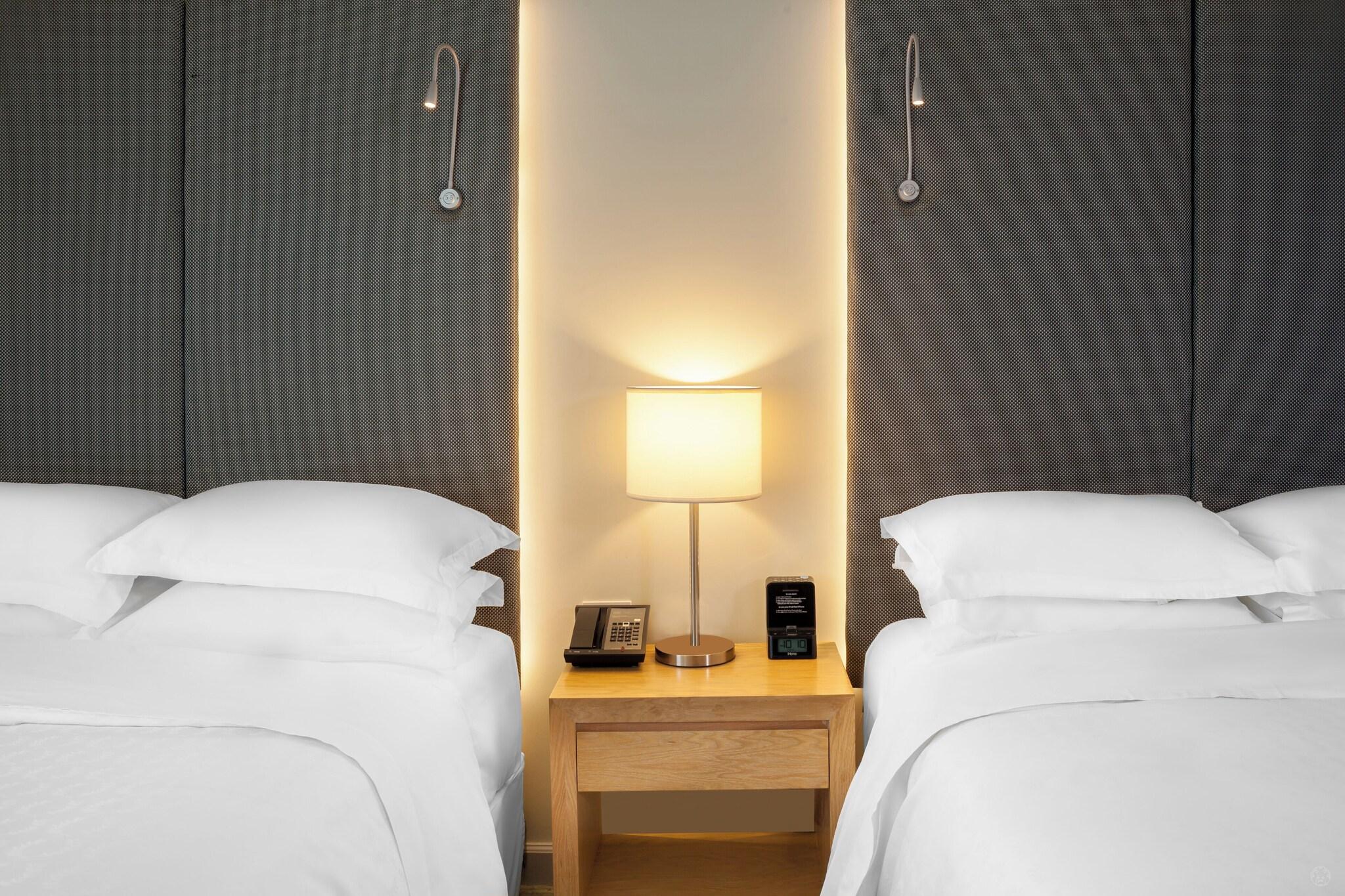 Quadruple Club Two Queen Beds