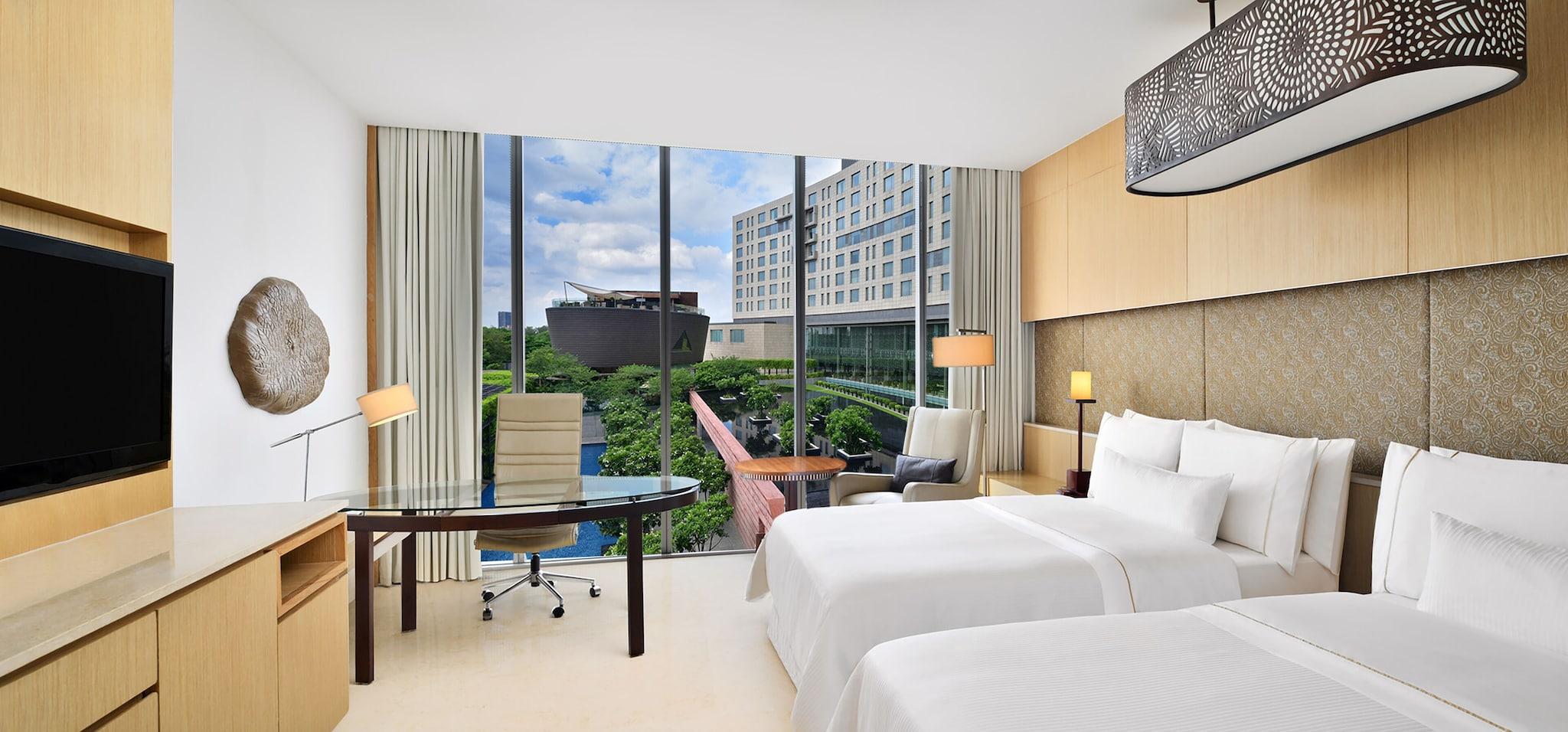 Quadruple Two Queen Beds Pool View