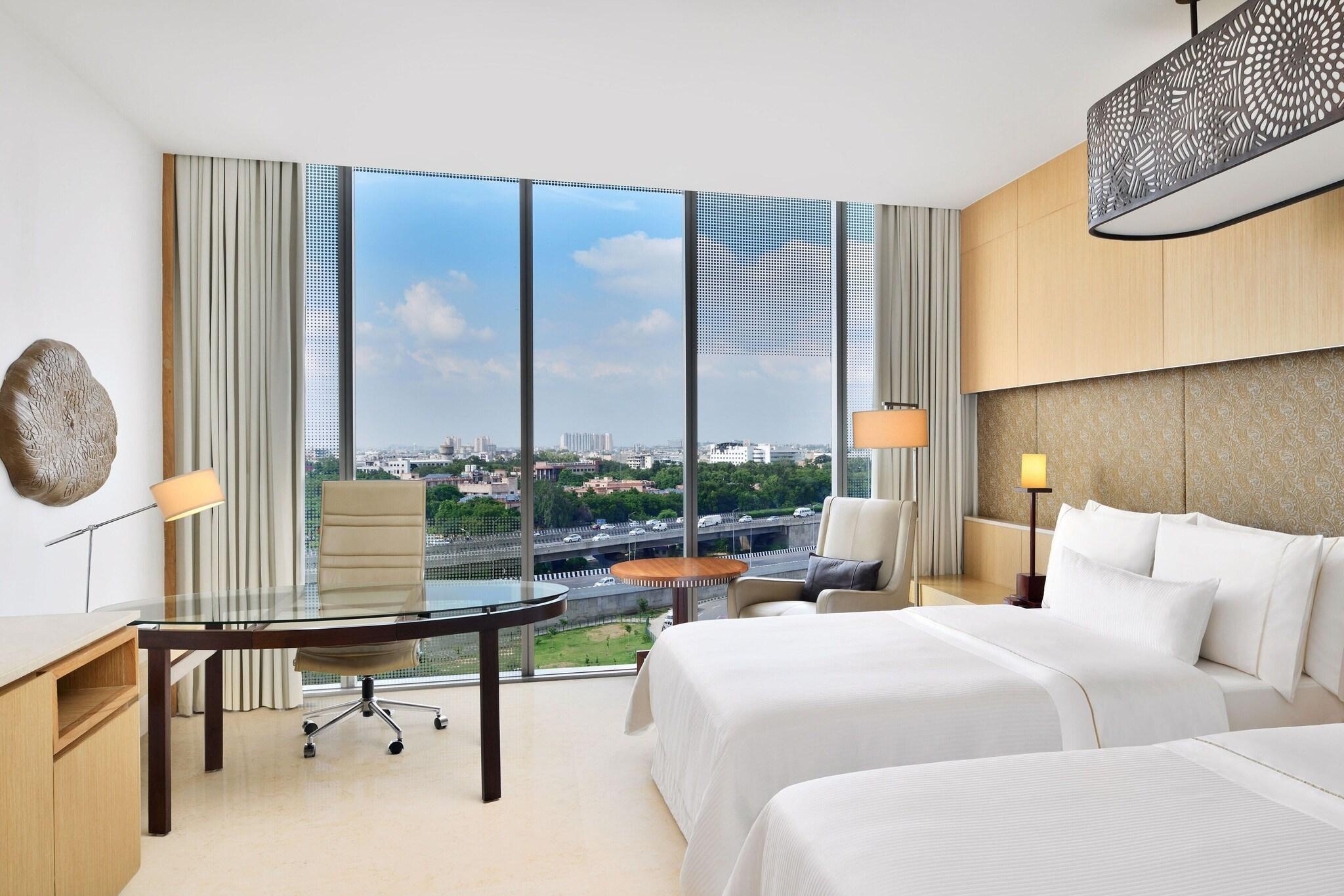 Quadruple Two Queen Beds Pool View