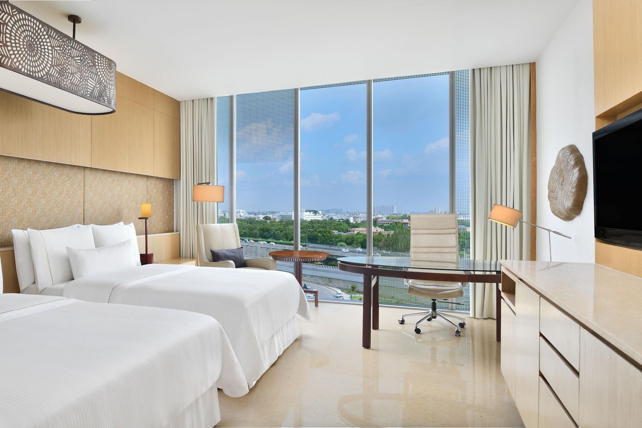 Quadruple Two Queen Beds Pool View