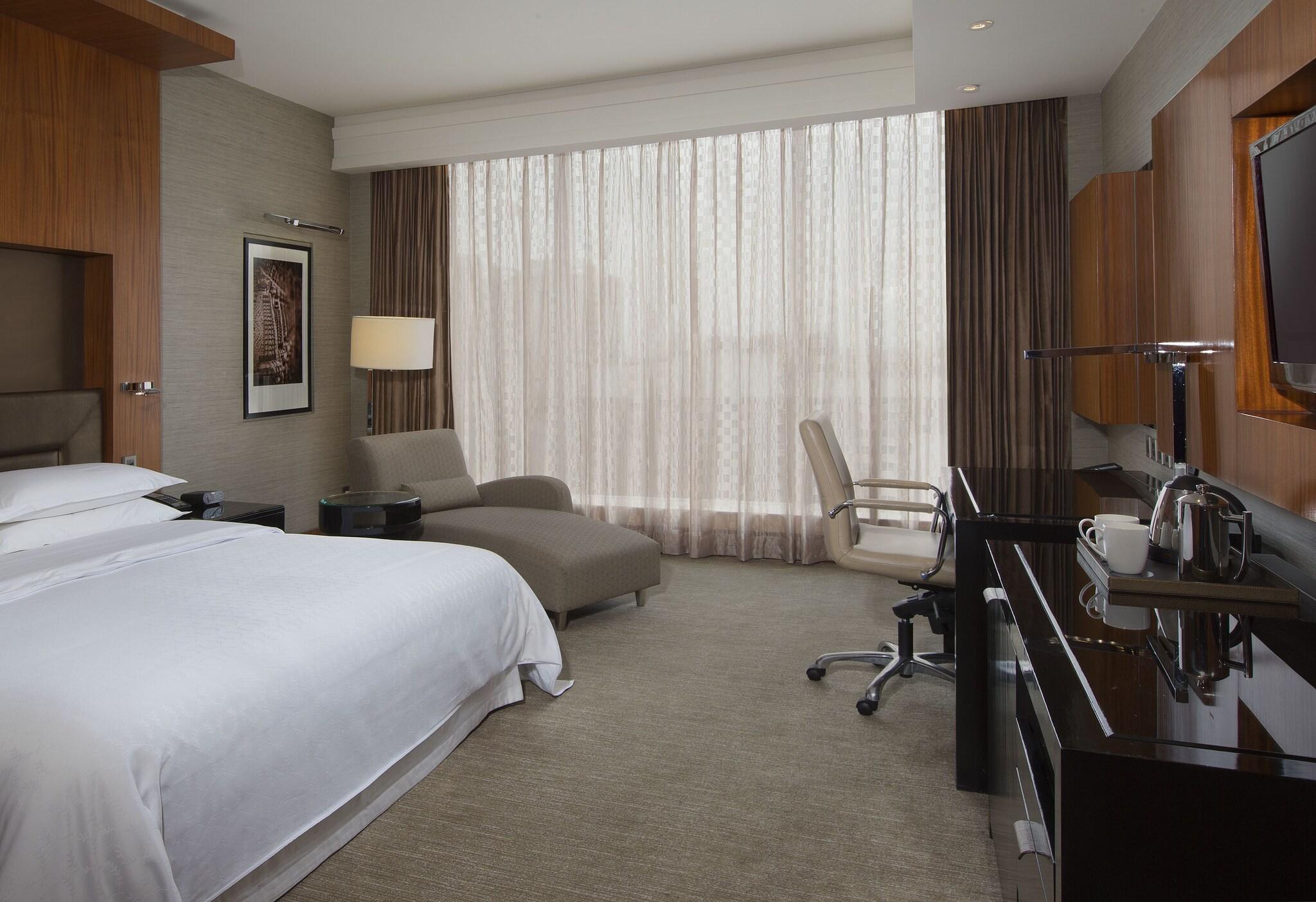 Quadruple City View Two Queen Beds