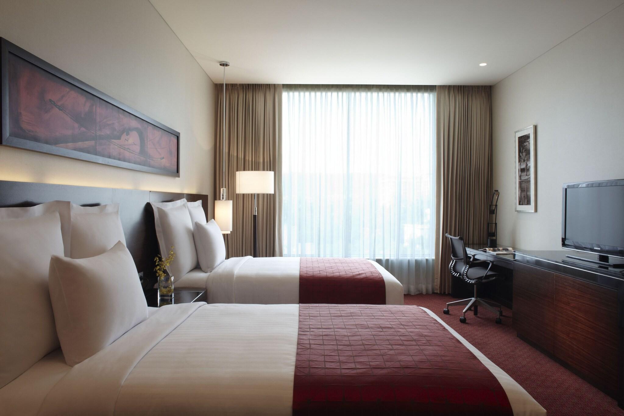 Quadruple City View Two Queen Beds